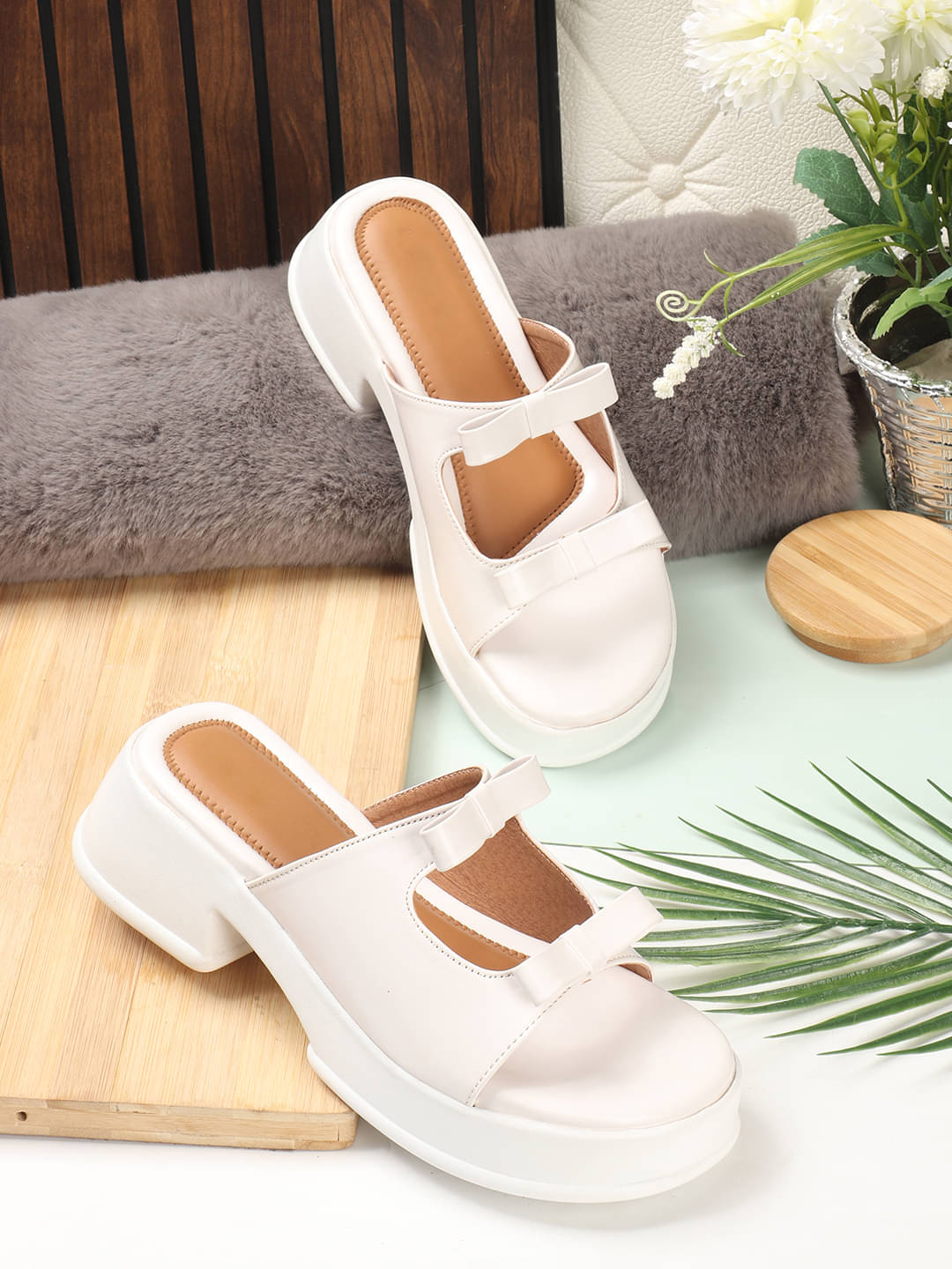     			Sneakersvilla White Women's Slip On Heels