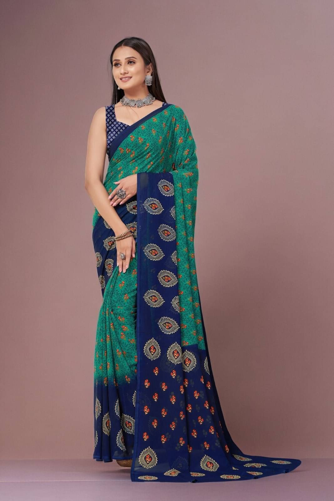 Vibhagyaa Georgette Printed Saree With Unstitched Blouse Piece ( Blue ) Vibhagyaa Georgette Printed Saree With Unstitched Blouse Piece ( Blue )