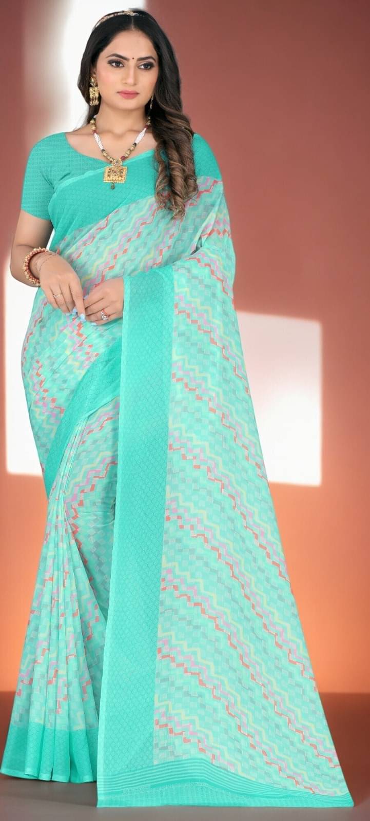 Vibhagyaa Georgette Printed Saree With Unstitched Blouse Piece ( Light Blue ) Vibhagyaa Georgette Printed Saree With Unstitched Blouse Piece ( Light Blue )
