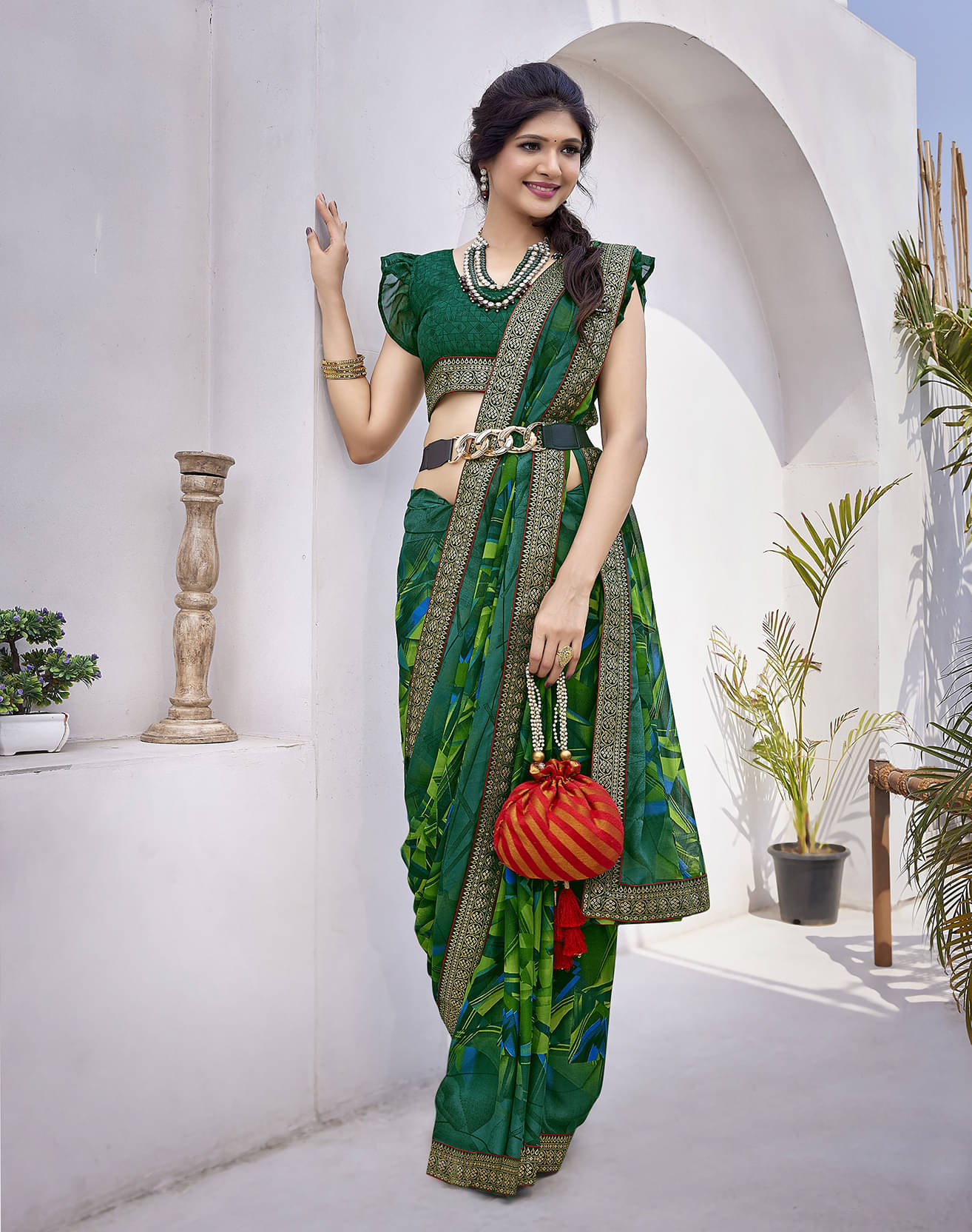     			Yashika Georgette Printed Saree With Unstitched Blouse Piece ( Green )