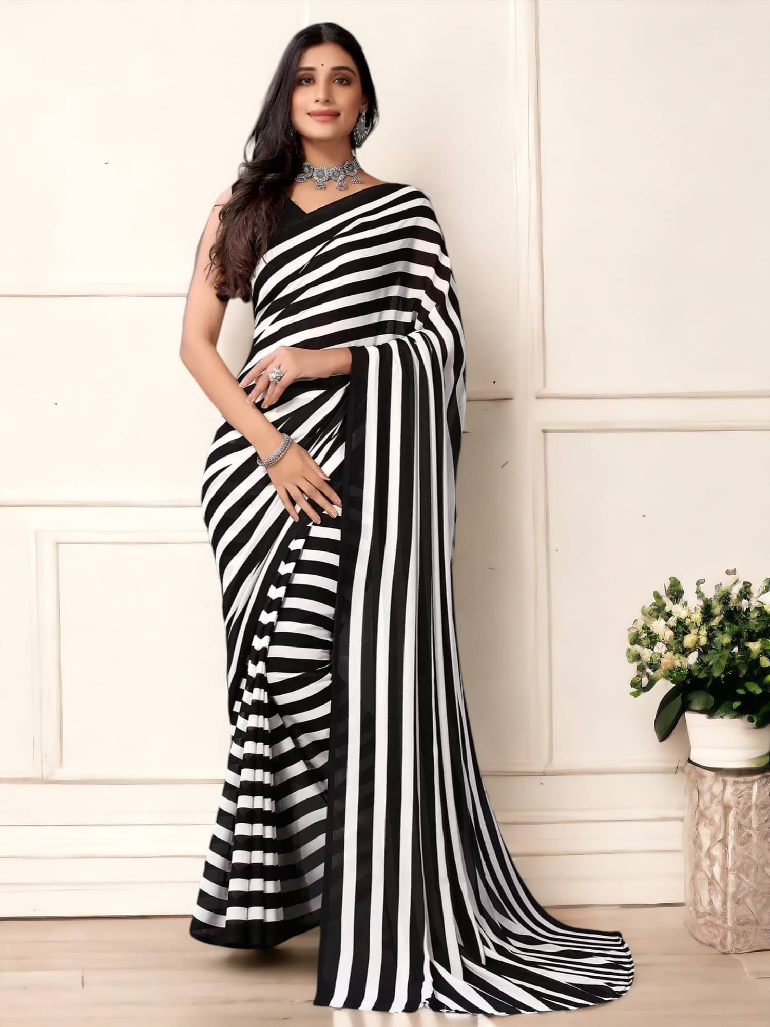     			TTH Georgette Embroidered Saree With Unstitched Blouse Piece ( Black )