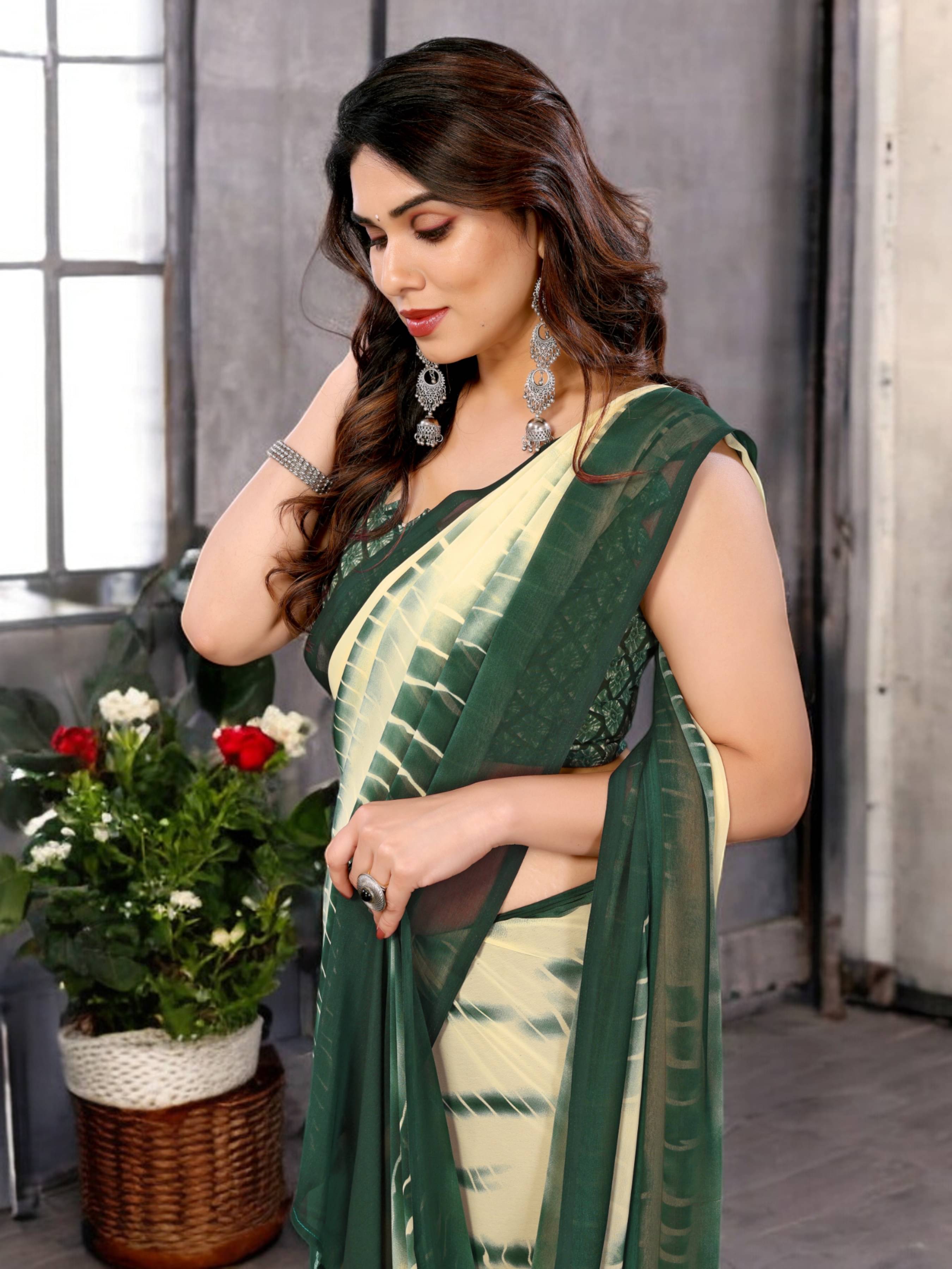 TTH Georgette Printed Saree With Unstitched Blouse Piece ( Green ) TTH Georgette Printed Saree With Unstitched Blouse Piece ( Green )