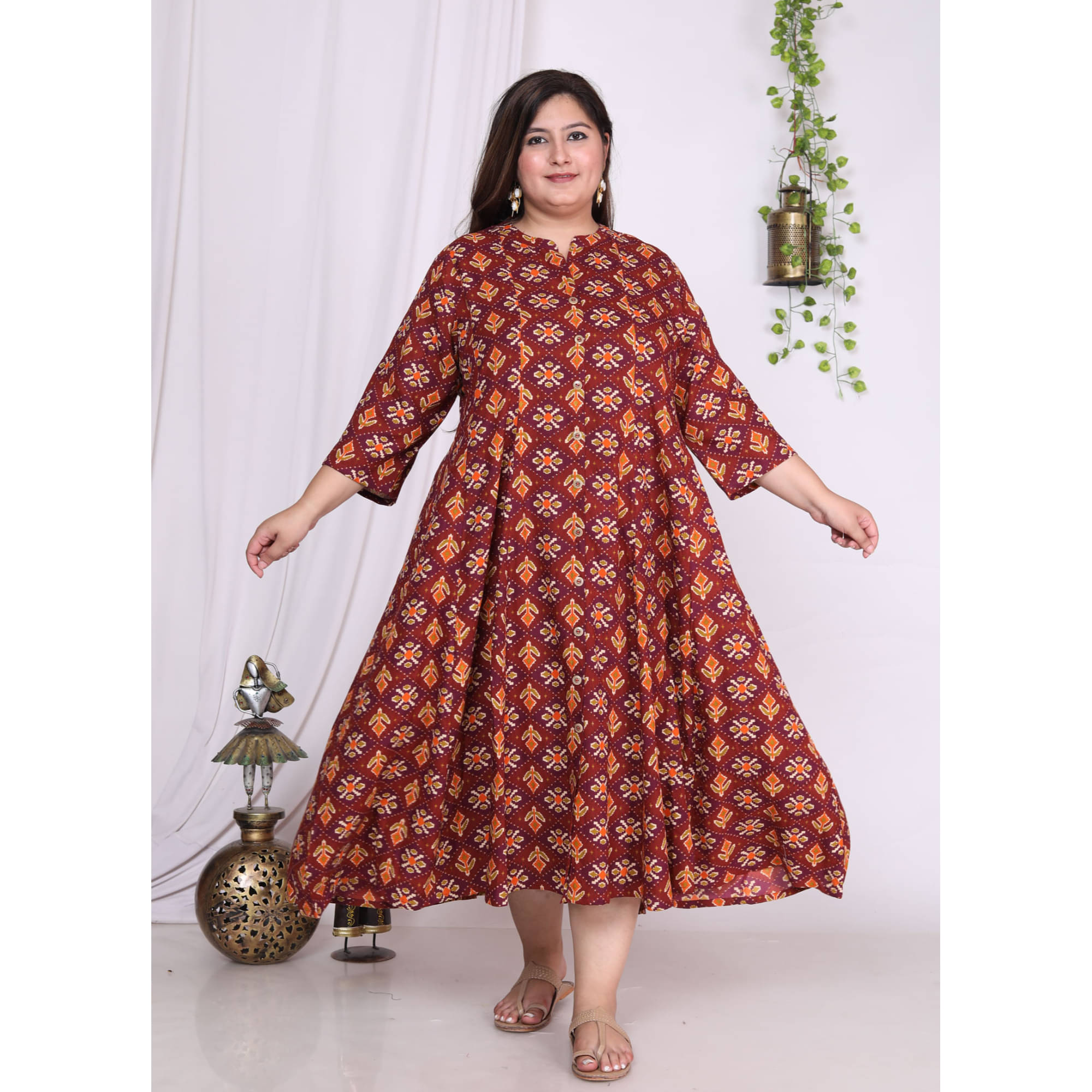 Swasti Pack of 1 Cotton Blend Printed Flared Women's Kurti - ( Maroon )     			Swasti Pack of 1 Cotton Blend Printed Flared Women's Kurti - ( Maroon )