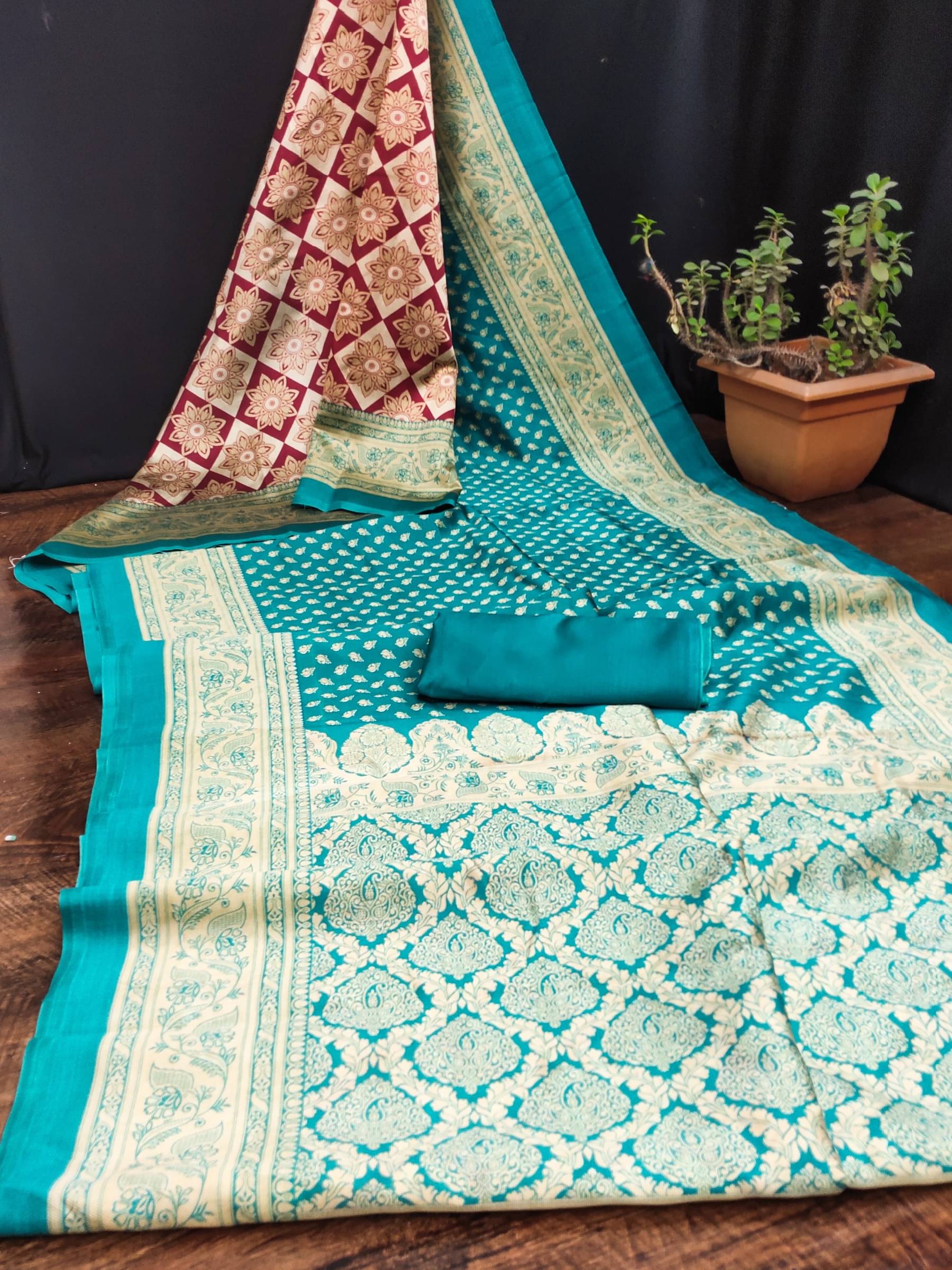 Kanooda Prints Art Silk Printed Saree With Unstitched Blouse Piece ( Blue )     			Kanooda Prints Art Silk Printed Saree With Unstitched Blouse Piece ( Blue )