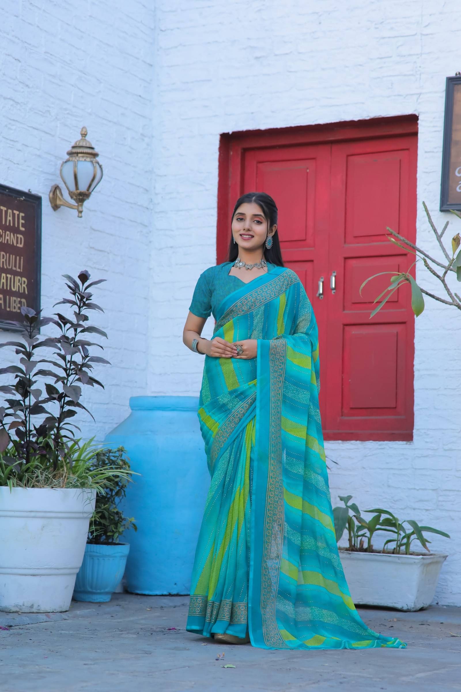 Kanooda Prints Chiffon Printed Saree With Unstitched Blouse Piece ( Teal ) Kanooda Prints Chiffon Printed Saree With Unstitched Blouse Piece ( Teal )