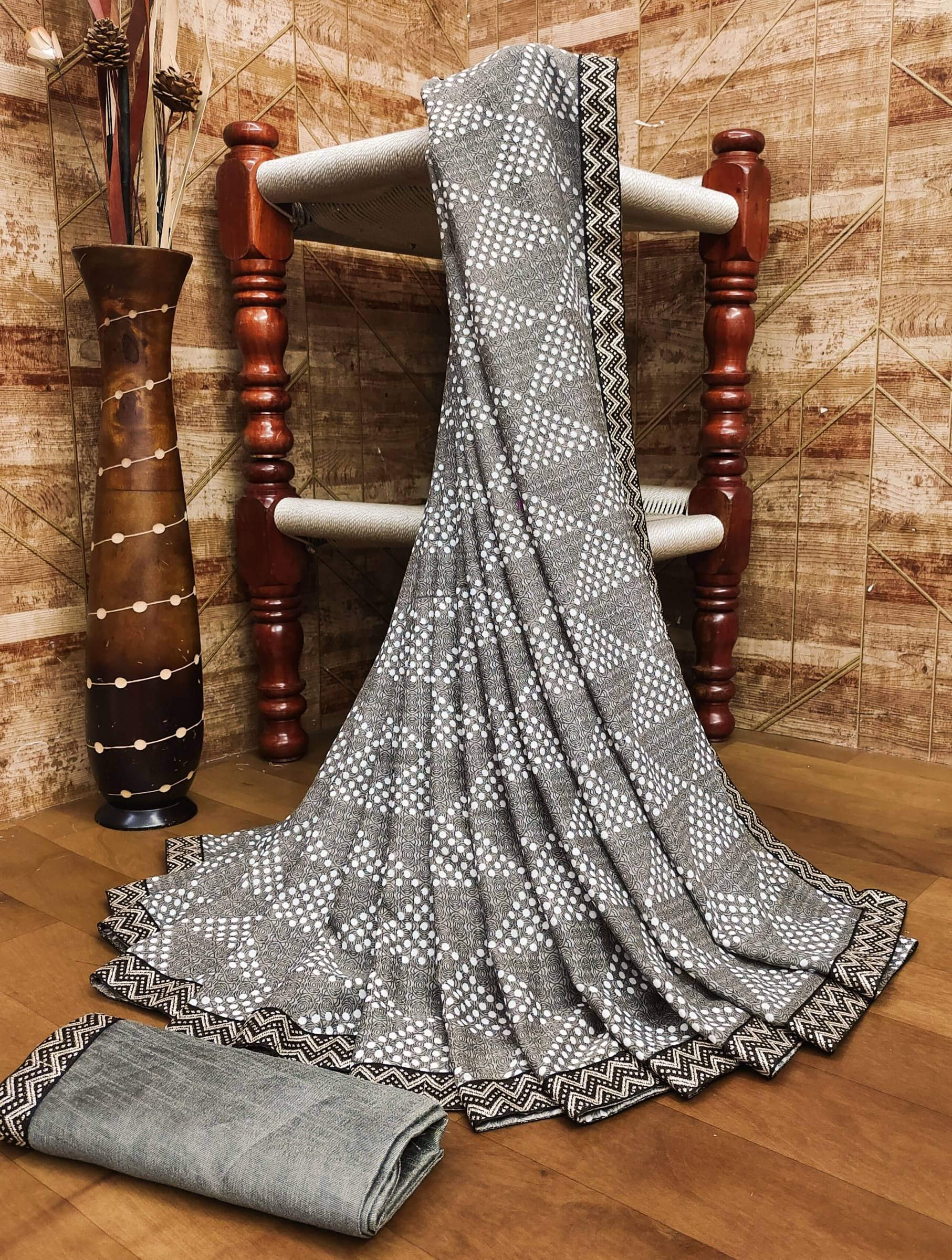     			Kanooda Prints Georgette Printed Saree With Unstitched Blouse Piece ( Brown )