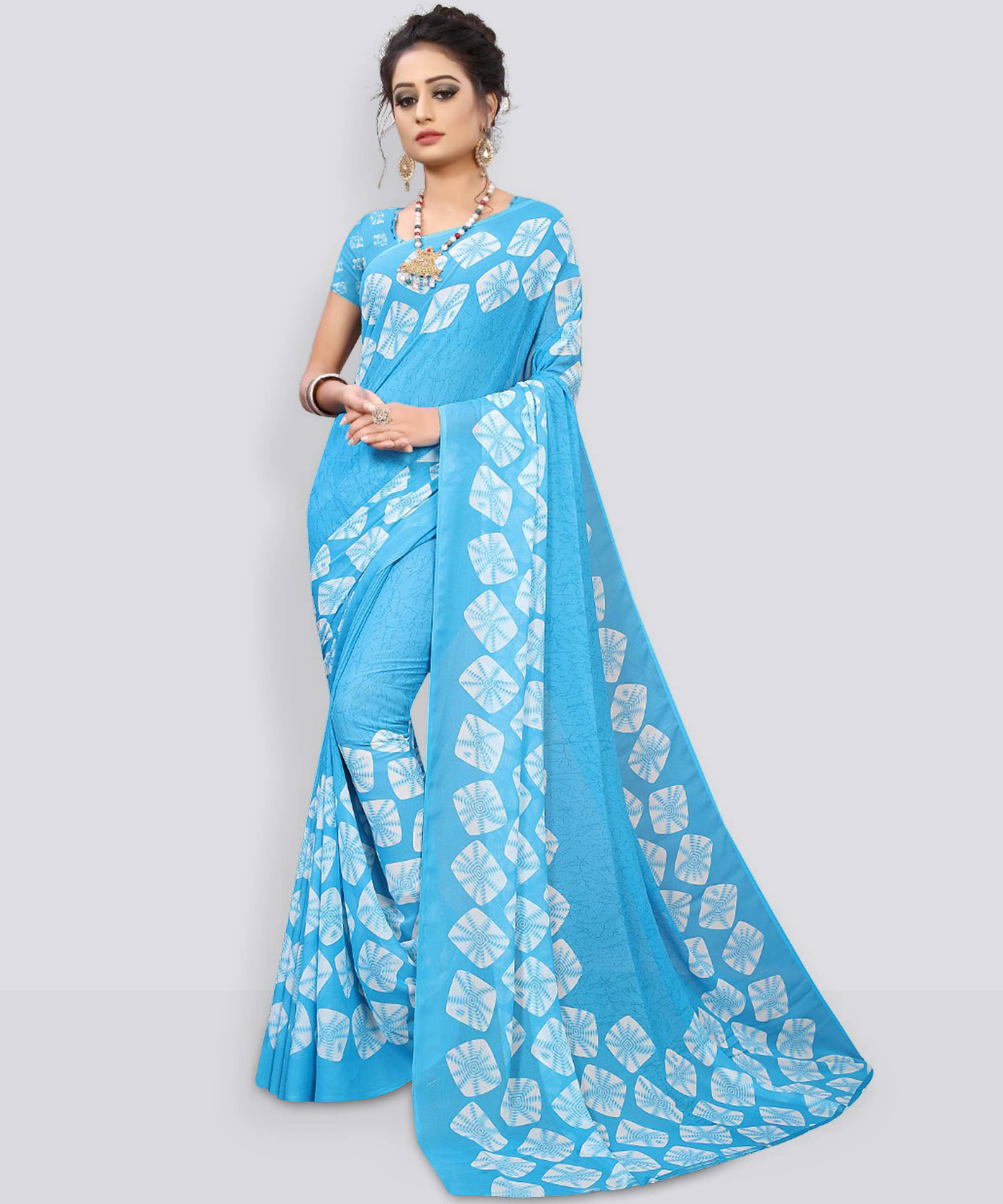 Kanooda Prints Georgette Printed Saree With Unstitched Blouse Piece ( Blue ) Kanooda Prints Georgette Printed Saree With Unstitched Blouse Piece ( Blue )