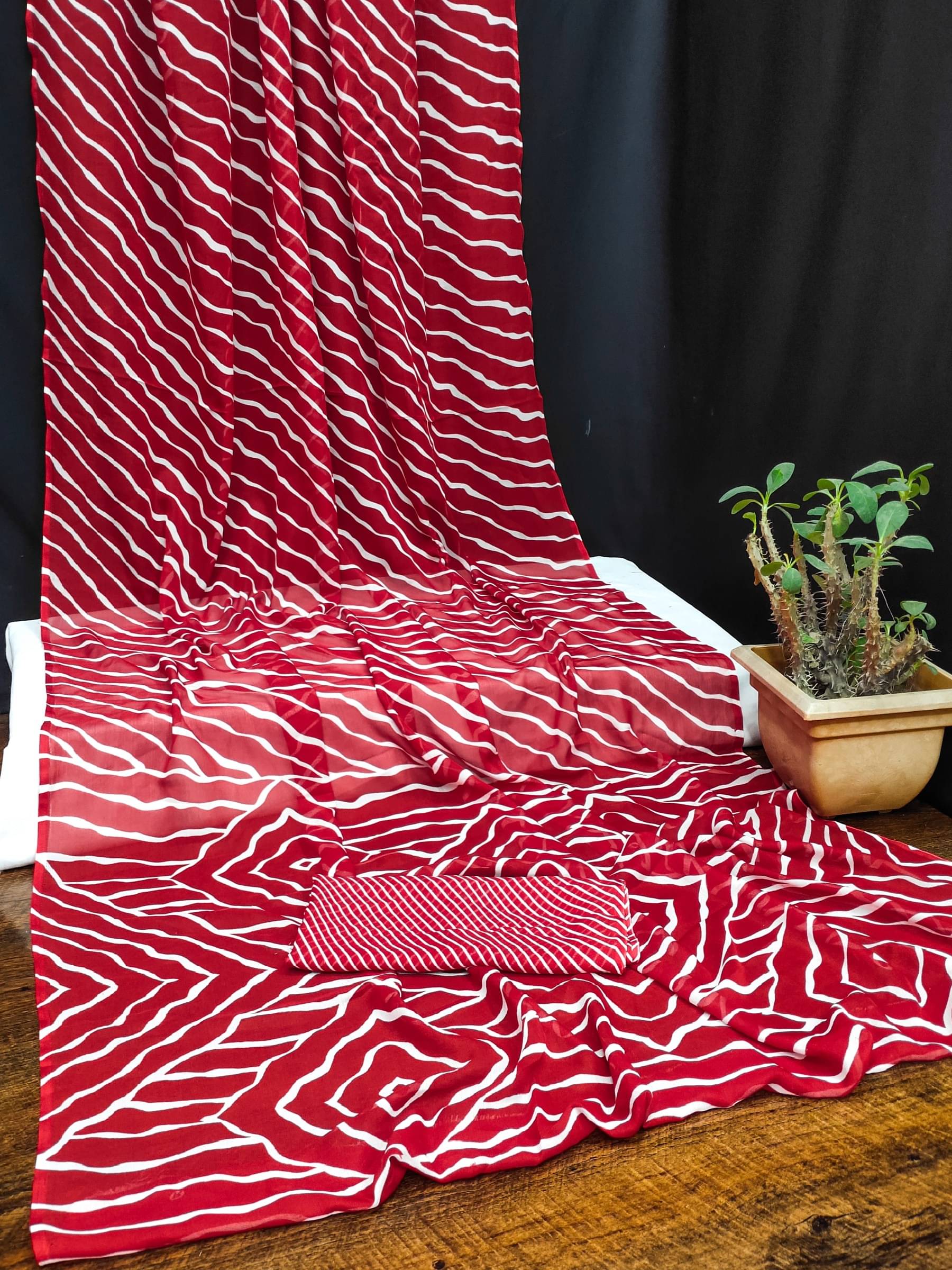 Kanooda Prints Georgette Printed Saree With Unstitched Blouse Piece ( Red ) Kanooda Prints Georgette Printed Saree With Unstitched Blouse Piece ( Red )