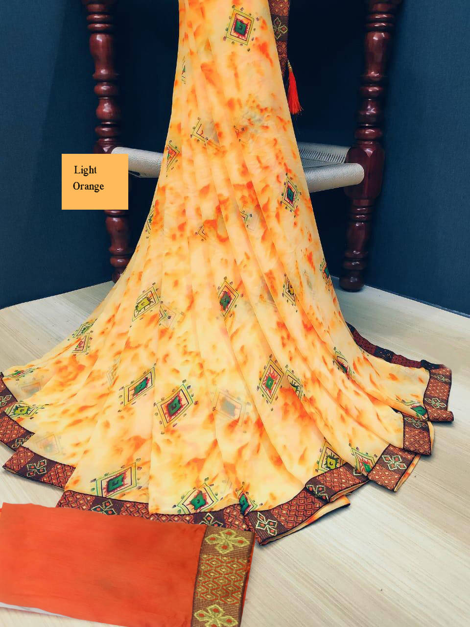     			Kanooda Prints Georgette Printed Saree With Unstitched Blouse Piece ( Orange )