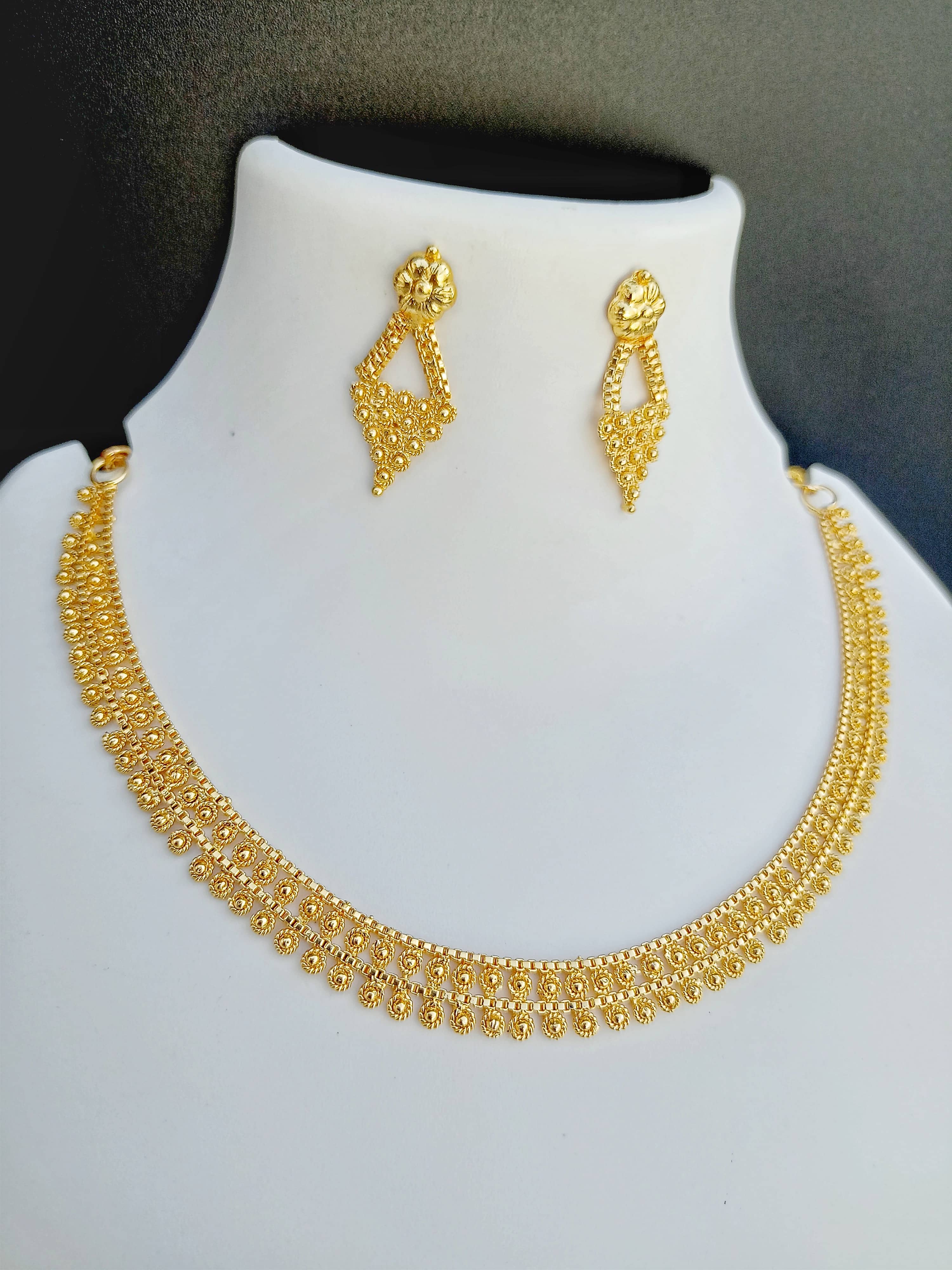 ROFARWORD Gold Brass Necklace Set ( Pack of 1 )
