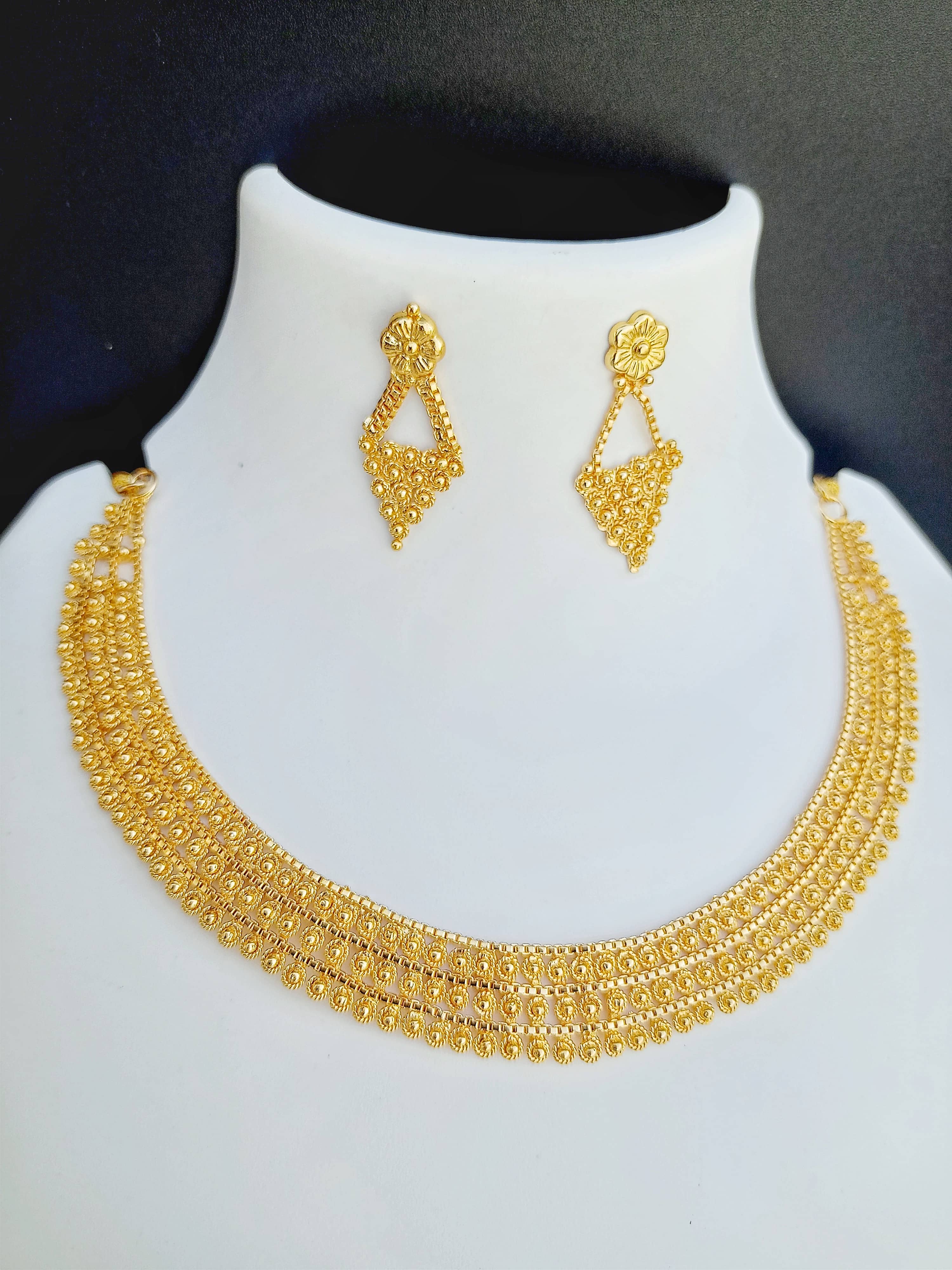 ROFARWORD Gold Brass Necklace Set ( Pack of 1 )