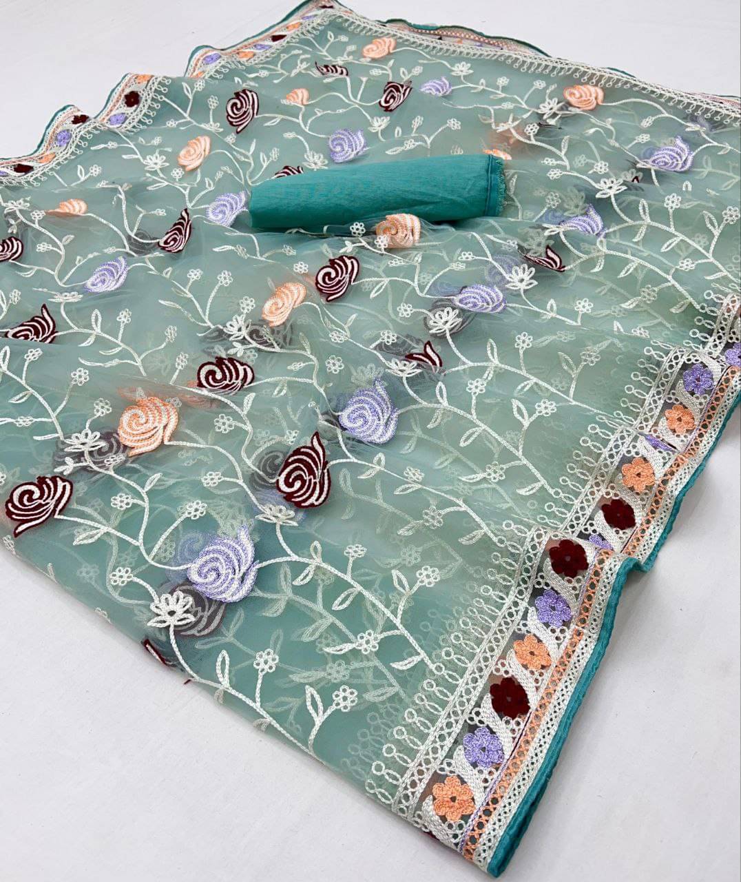 Arkia Net Embellished Saree With Unstitched Blouse Piece ( Aqua Blue ) Arkia Net Embellished Saree With Unstitched Blouse Piece ( Aqua Blue )