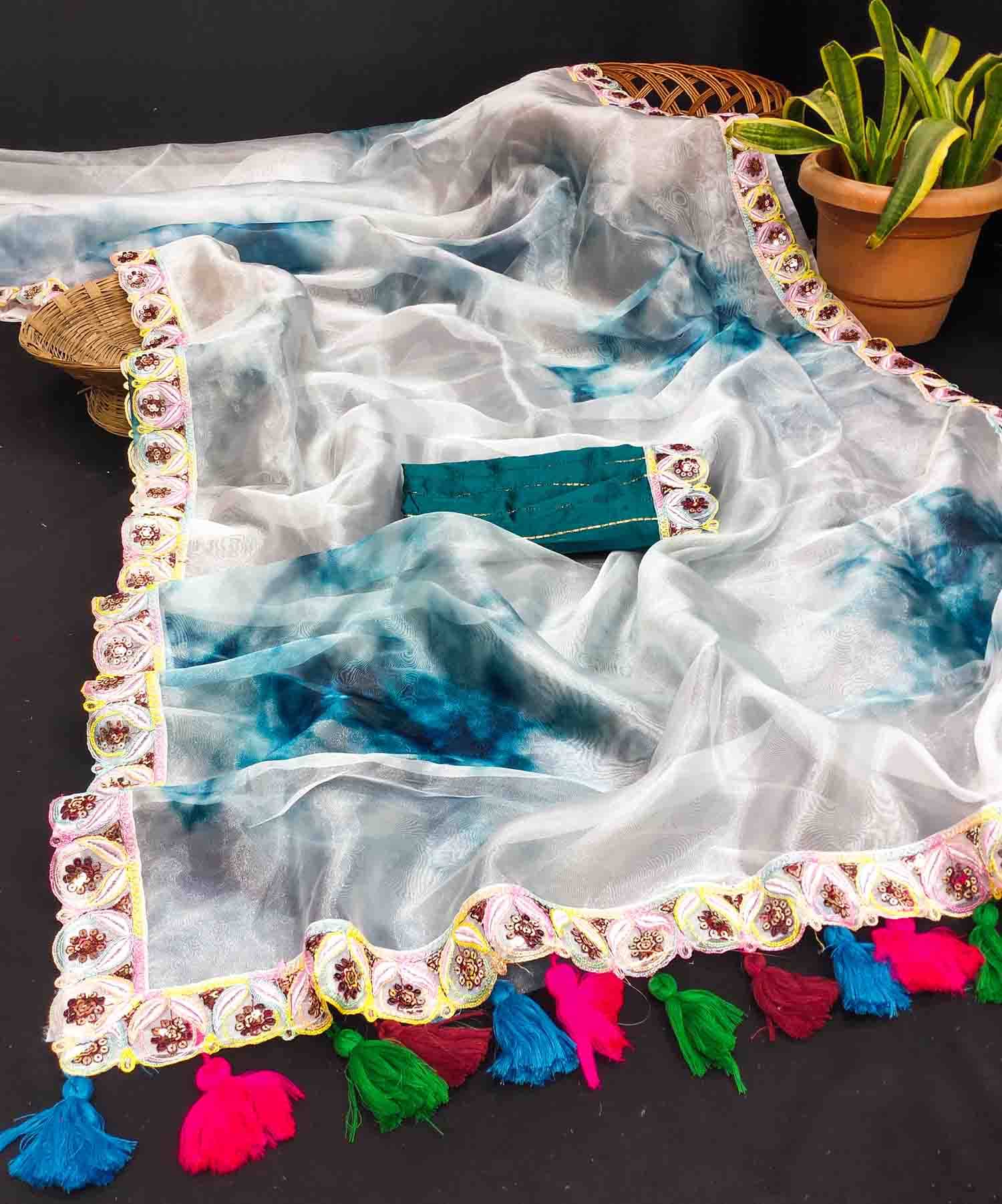 BAYUPRI Organza Embroidered Saree With Unstitched Blouse Piece ( White,Rama ) BAYUPRI Organza Embroidered Saree With Unstitched Blouse Piece ( White,Rama )