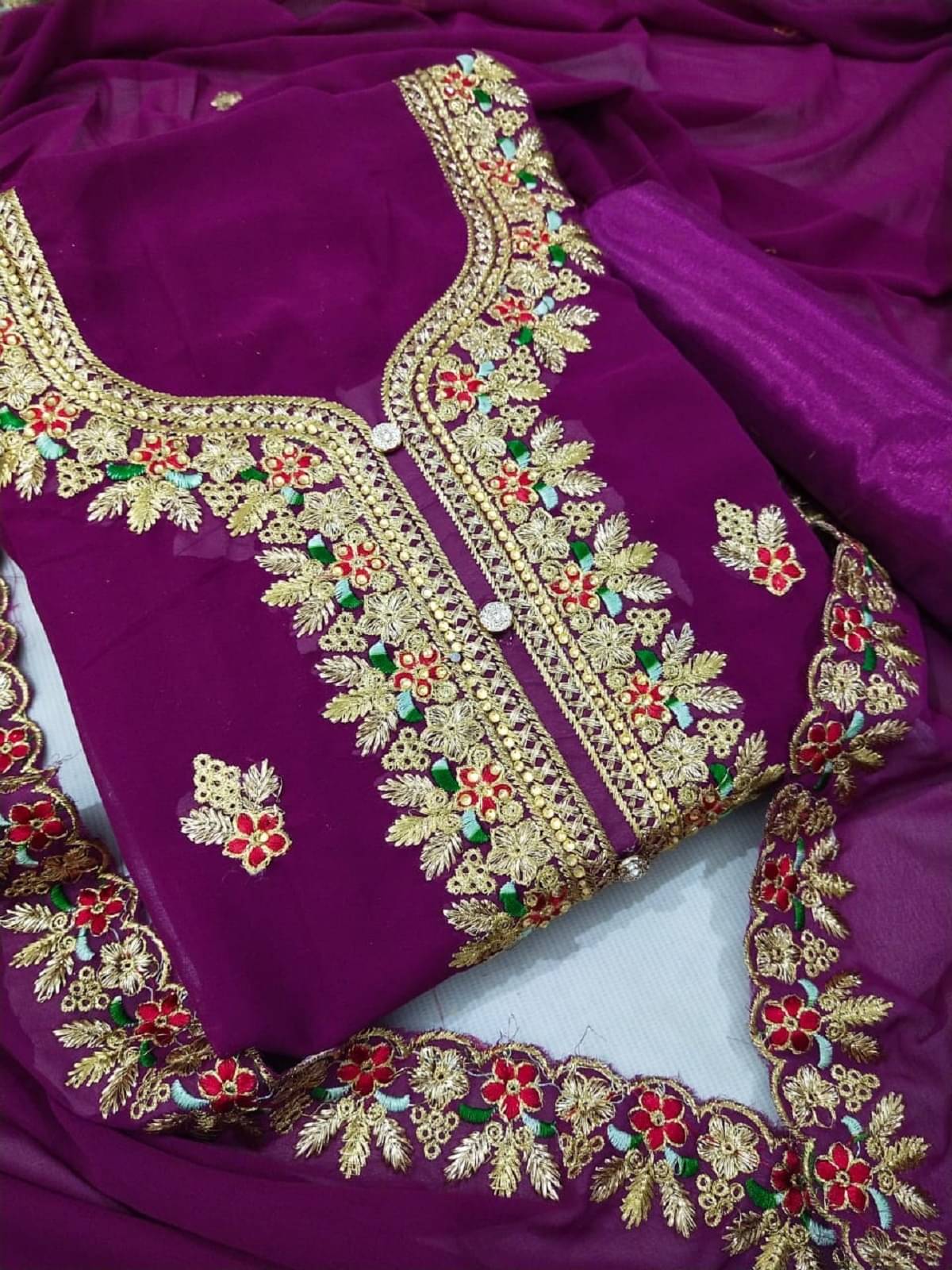Nayanthara Trends Unstitched Georgette Embroidered Dress Material - Purple ( Pack of 1 ) Nayanthara Trends Unstitched Georgette Embroidered Dress Material - Purple ( Pack of 1 )
