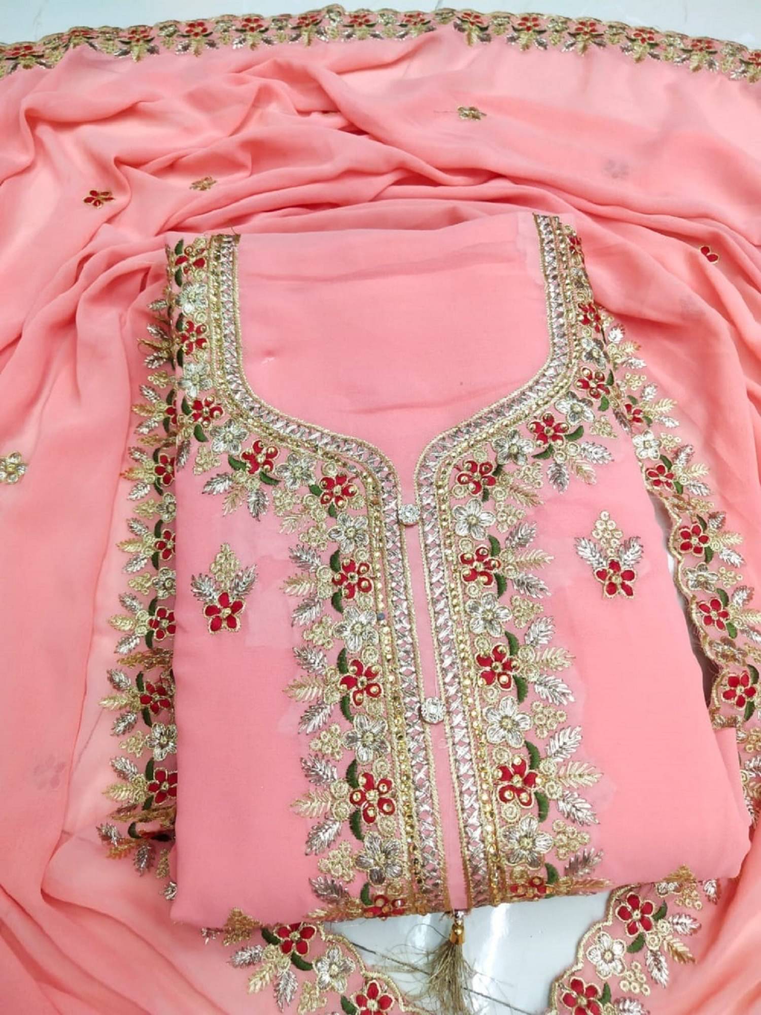     			Nayanthara Trends Unstitched Georgette Embroidered Dress Material - Peach ( Pack of 1 )