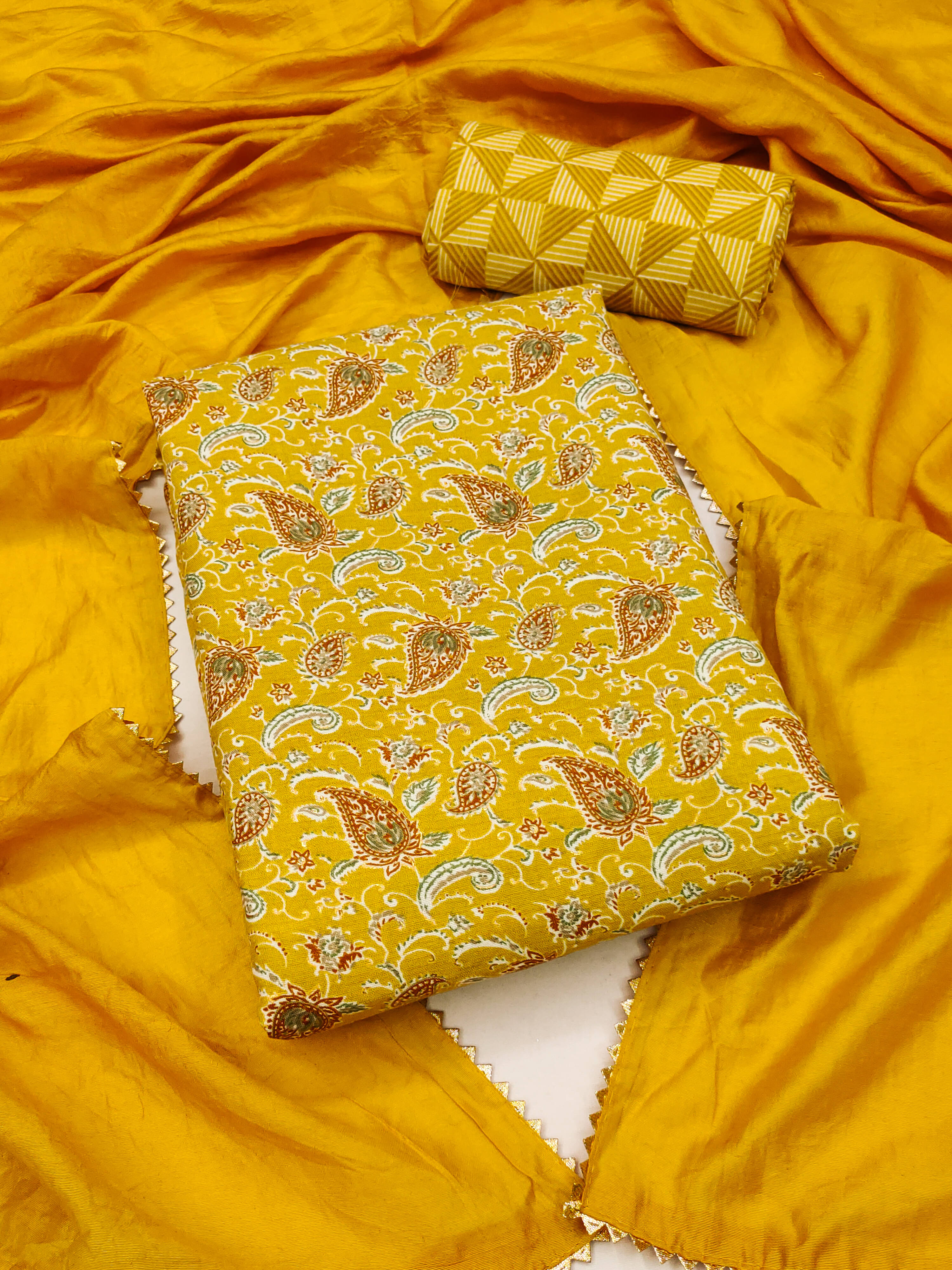 Nayanthara Trends Unstitched Cotton Blend Printed Dress Material - Yellow ( Pack of 1 ) Nayanthara Trends Unstitched Cotton Blend Printed Dress Material - Yellow ( Pack of 1 )