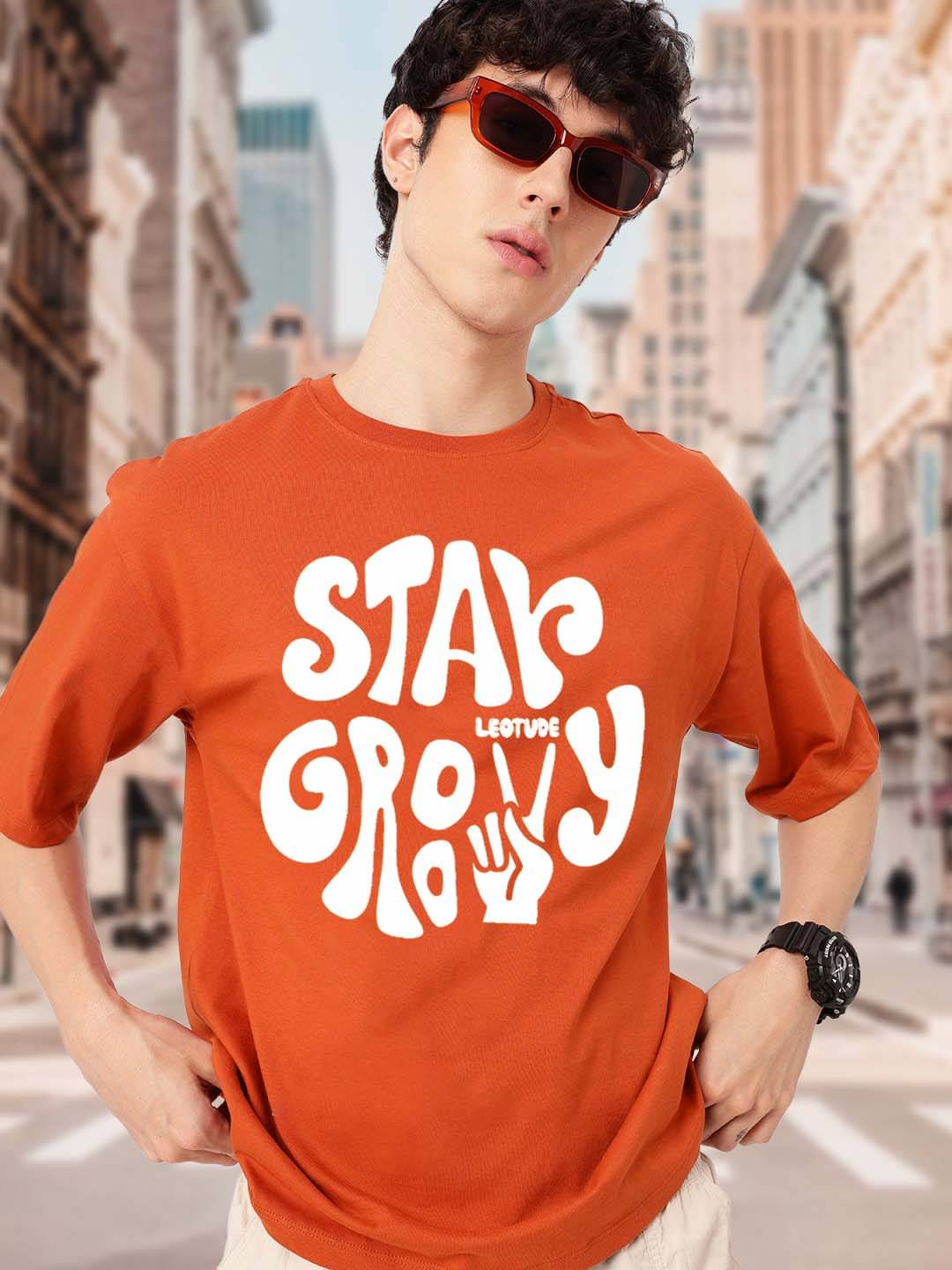 Leotude Men Cotton Blend Oversized Fit Printed T-Shirt ( Orange )     			Leotude Men Cotton Blend Oversized Fit Printed T-Shirt ( Orange )