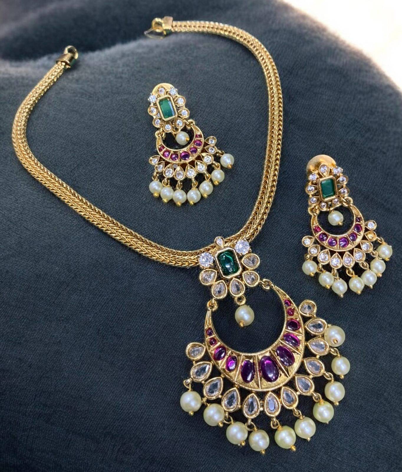     			KC JEWELS Multi Color Brass Necklace Set ( Pack of 1 )