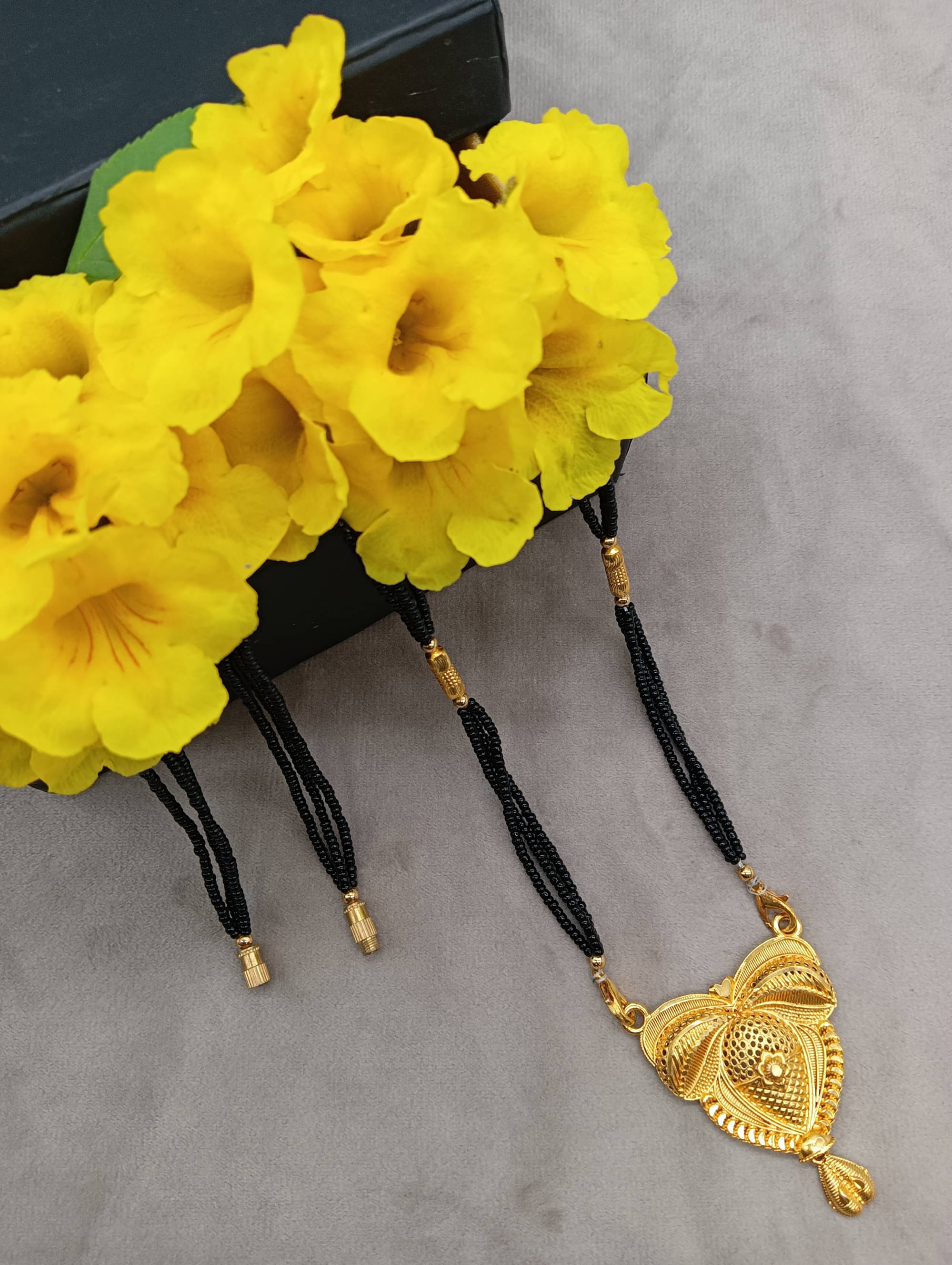 RANEM Golden Mangalsutra ( Pack of 1 )     			RANEM Golden Mangalsutra ( Pack of 1 )