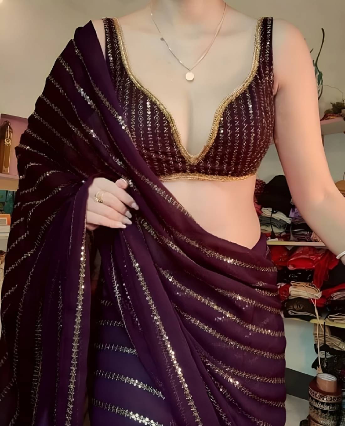     			KV Fashion Georgette Embroidered Saree With Unstitched Blouse Piece ( Wine )