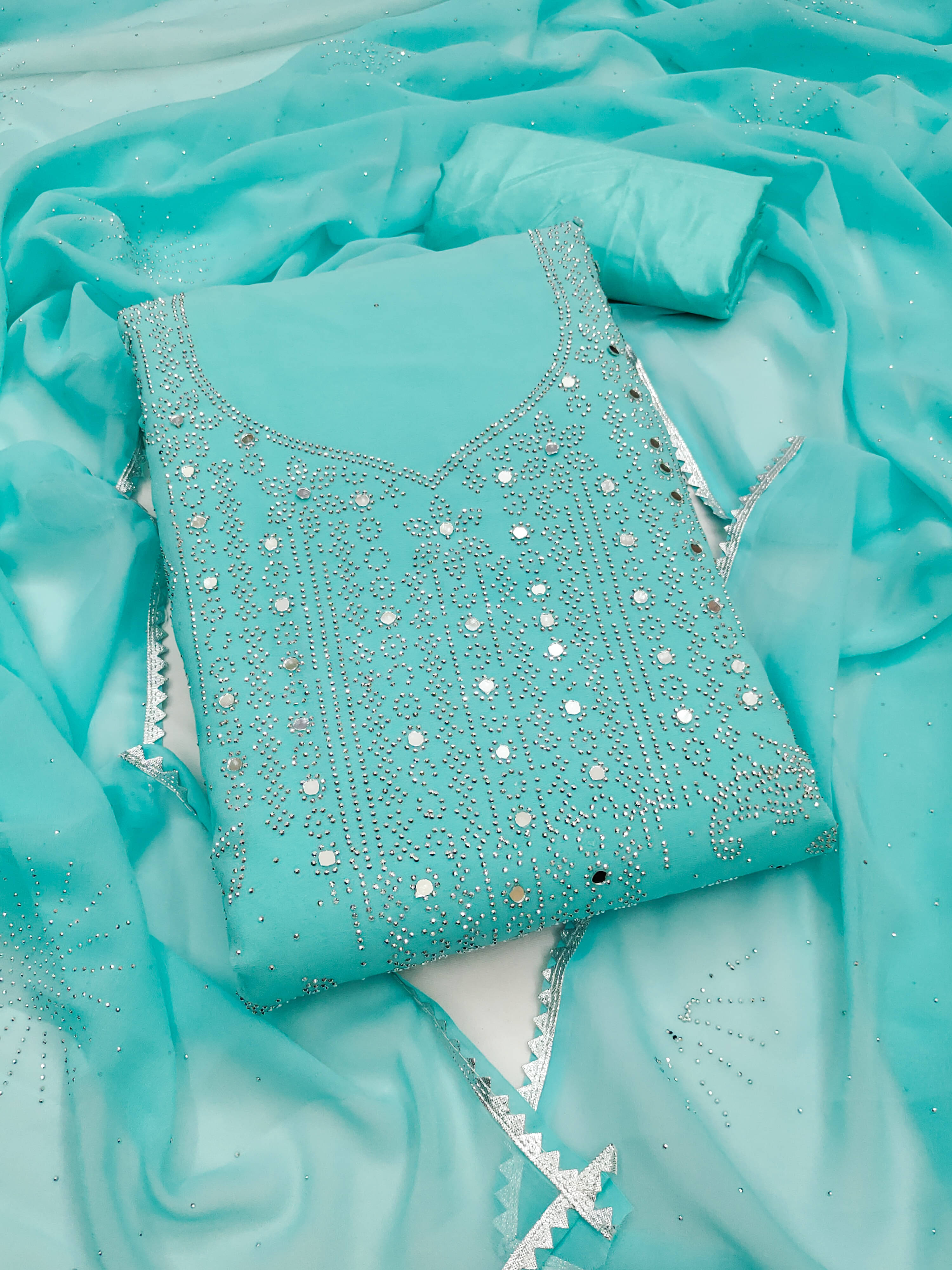     			Nayanthara Trends Unstitched Georgette Embellished Dress Material - Blue ( Pack of 1 )
