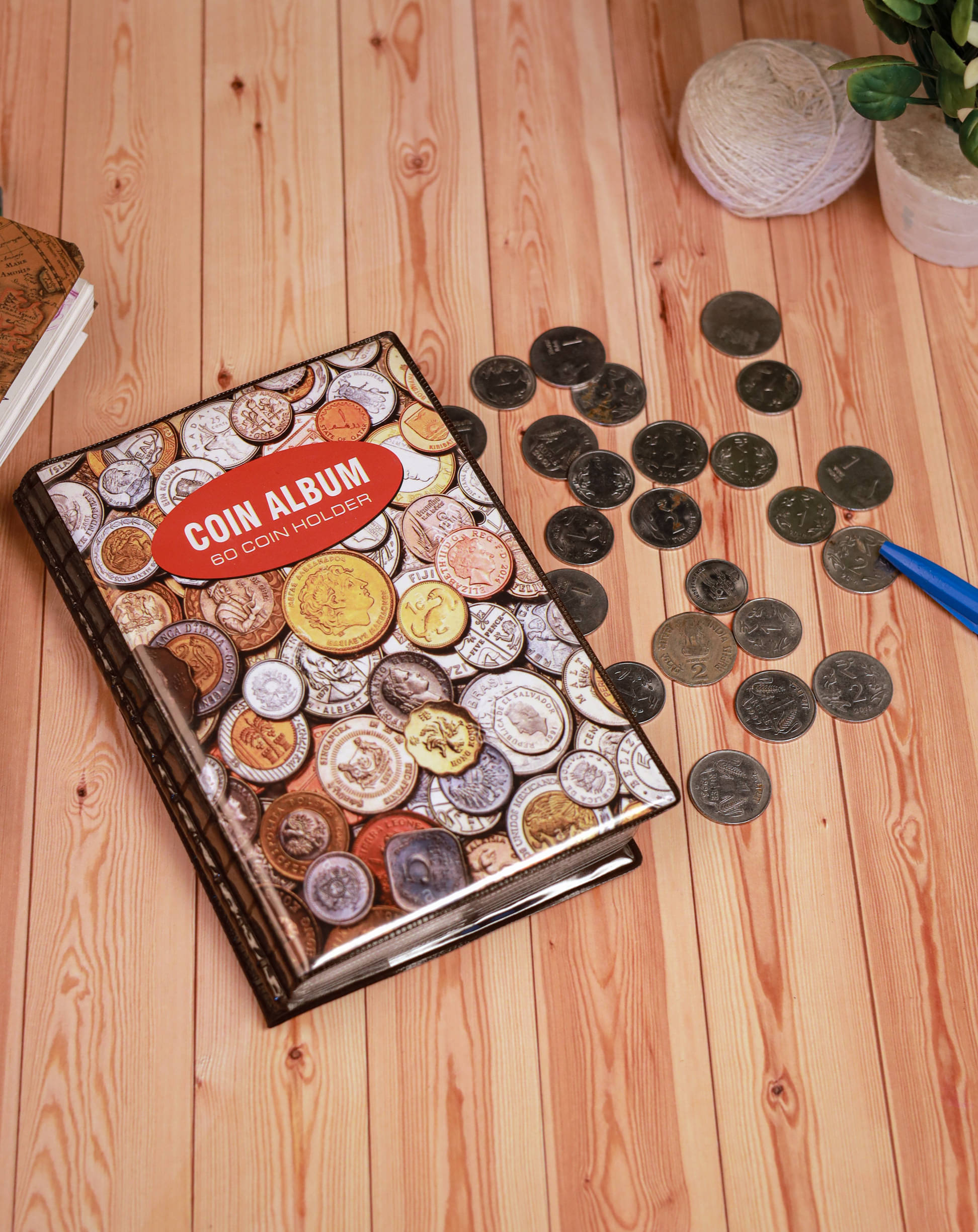 60 Different Coins from 60 Different Countries with Stickers of Country Names arranged in a Good Quality Album. 60 Different Coins from 60 Different Countries with Stickers of Country Names arranged in a Good Quality Album.