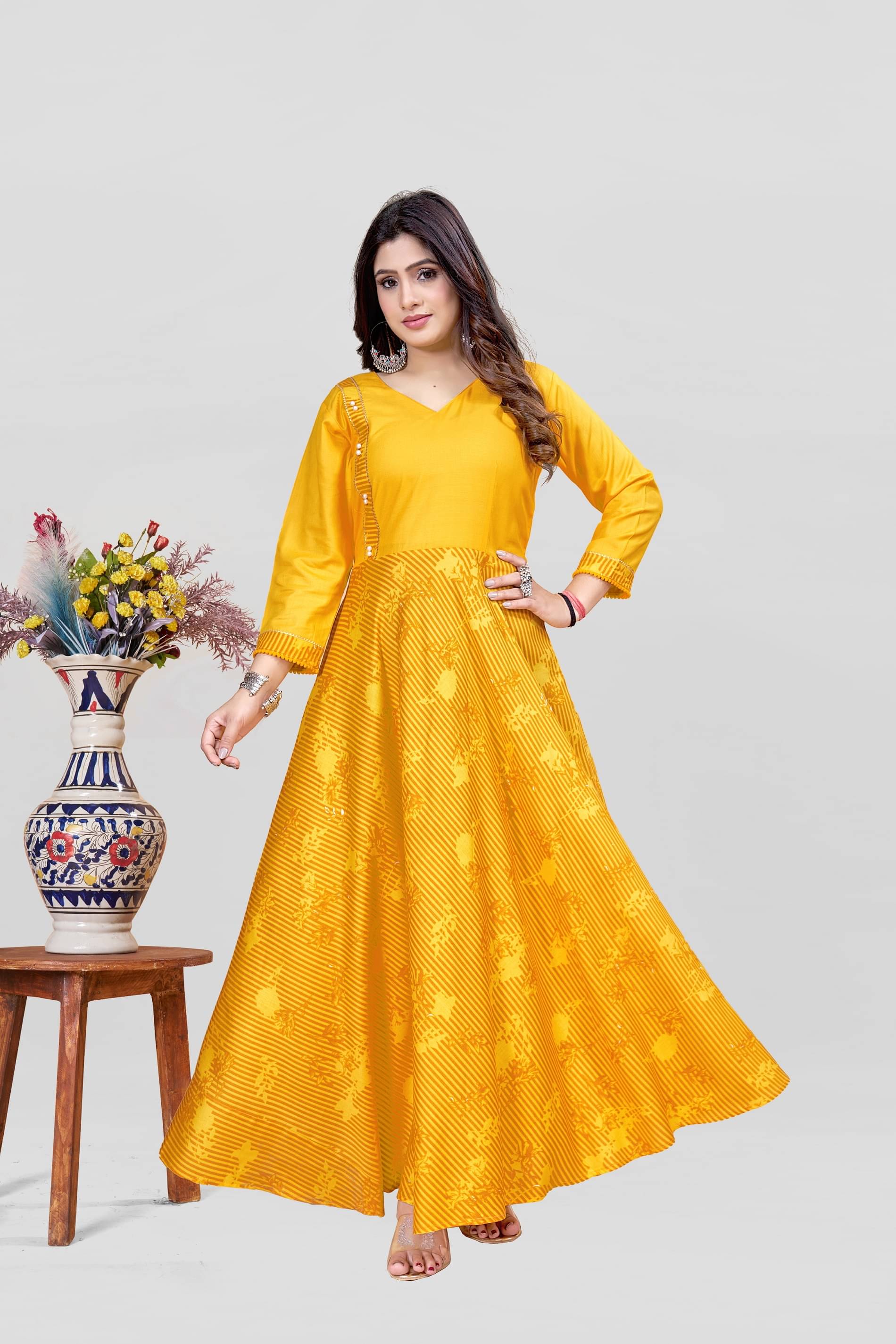 MEESORRA Pack of 1 Rayon Self Design Anarkali Women's Kurti - ( Yellow ) MEESORRA Pack of 1 Rayon Self Design Anarkali Women's Kurti - ( Yellow )