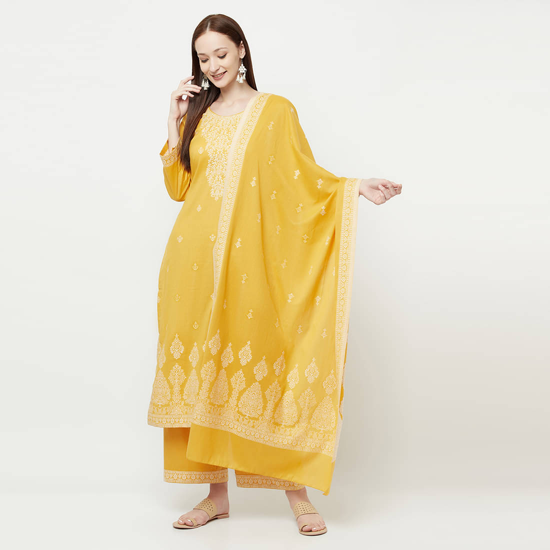 TAZO Unstitched Cotton Blend Printed Dress Material - Yellow ( Pack of 1 )     			TAZO Unstitched Cotton Blend Printed Dress Material - Yellow ( Pack of 1 )