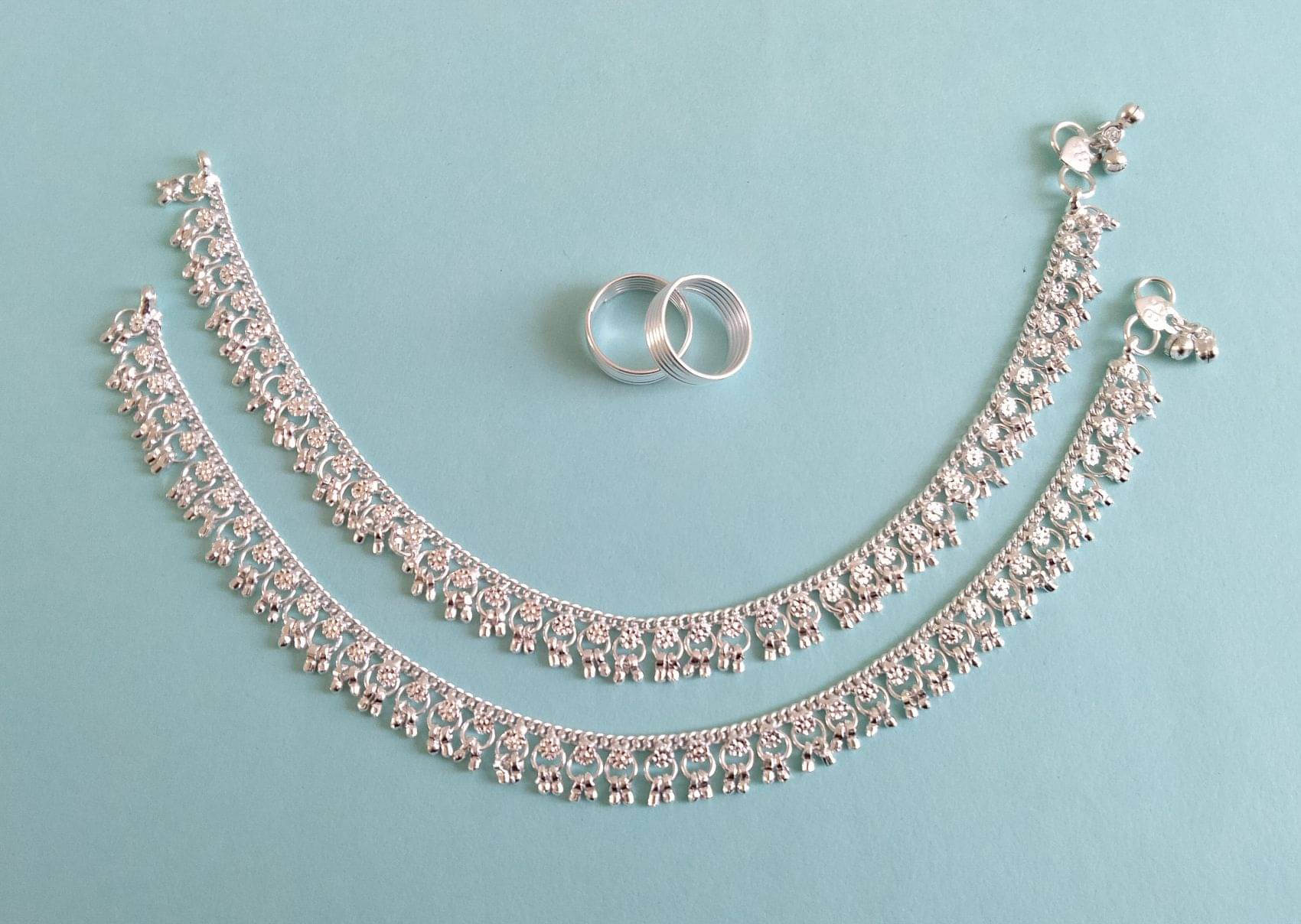 Pamadhya Silver Toe Rings & Anklet Set ( Pack of 2 ) Pamadhya Silver Toe Rings & Anklet Set ( Pack of 2 )