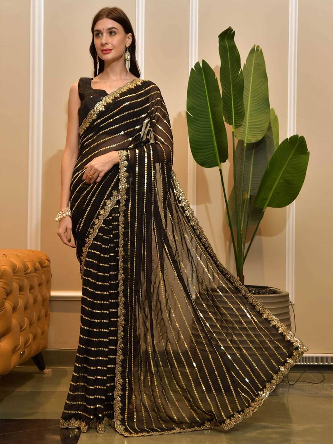     			KV Fashion Georgette Embellished Saree With Unstitched Blouse Piece ( Black )