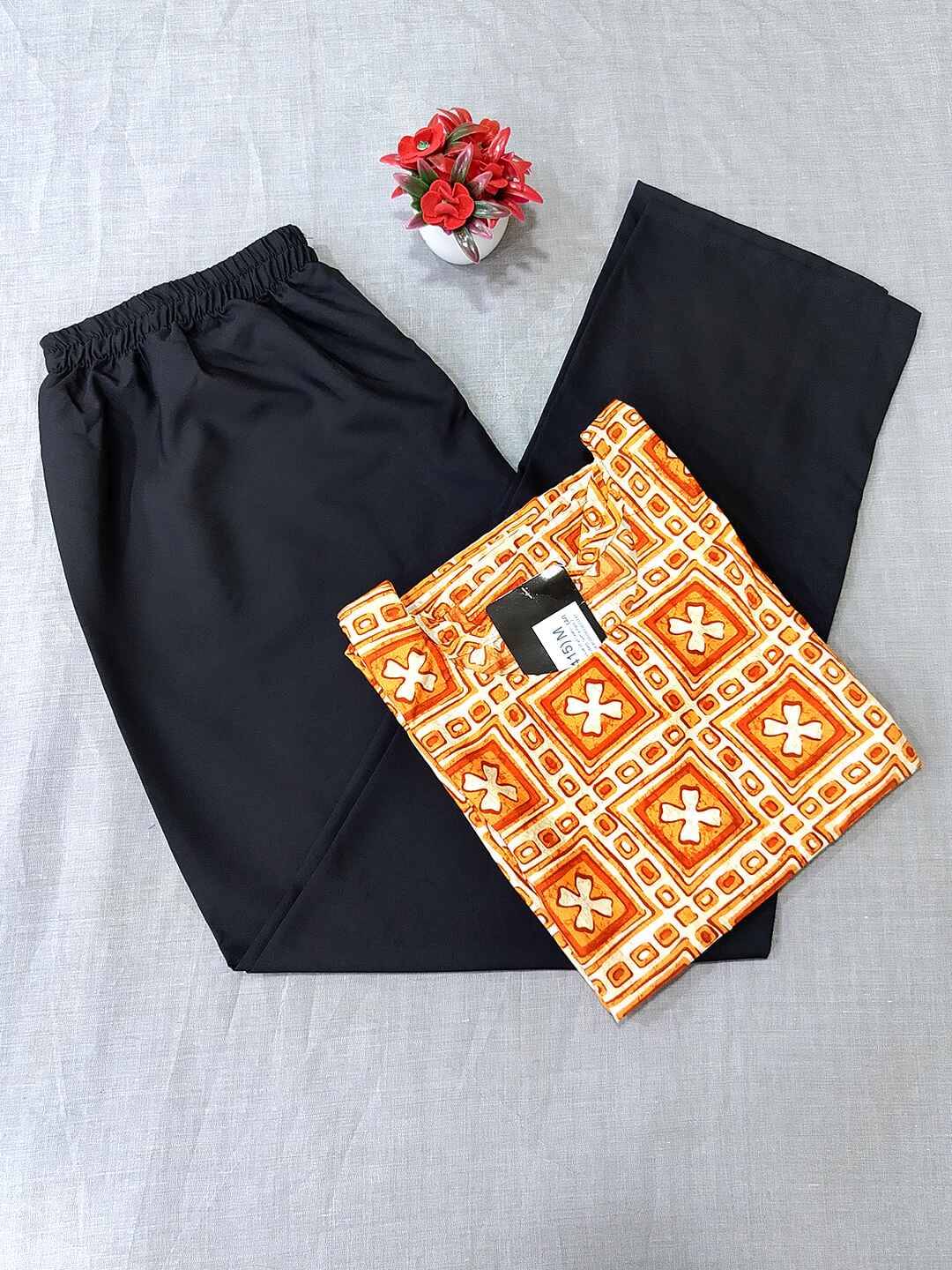 1 Stop Fashion Crepe Printed Kurti With Pants Women's Stitched Salwar Suit - Orange ( Pack of 1 )     			1 Stop Fashion Crepe Printed Kurti With Pants Women's Stitched Salwar Suit - Orange ( Pack of 1 )