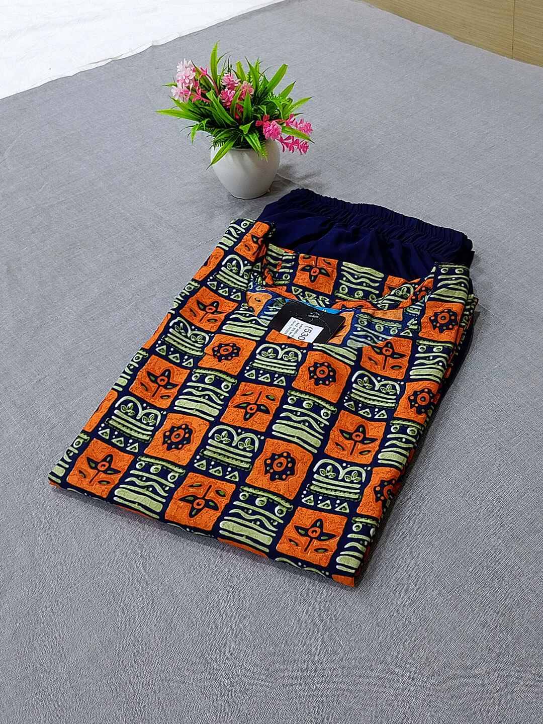 Ethnicbasket Crepe Printed Kurti With Pants Women's Stitched Salwar Suit - Orange ( Pack of 1 )     			Ethnicbasket Crepe Printed Kurti With Pants Women's Stitched Salwar Suit - Orange ( Pack of 1 )