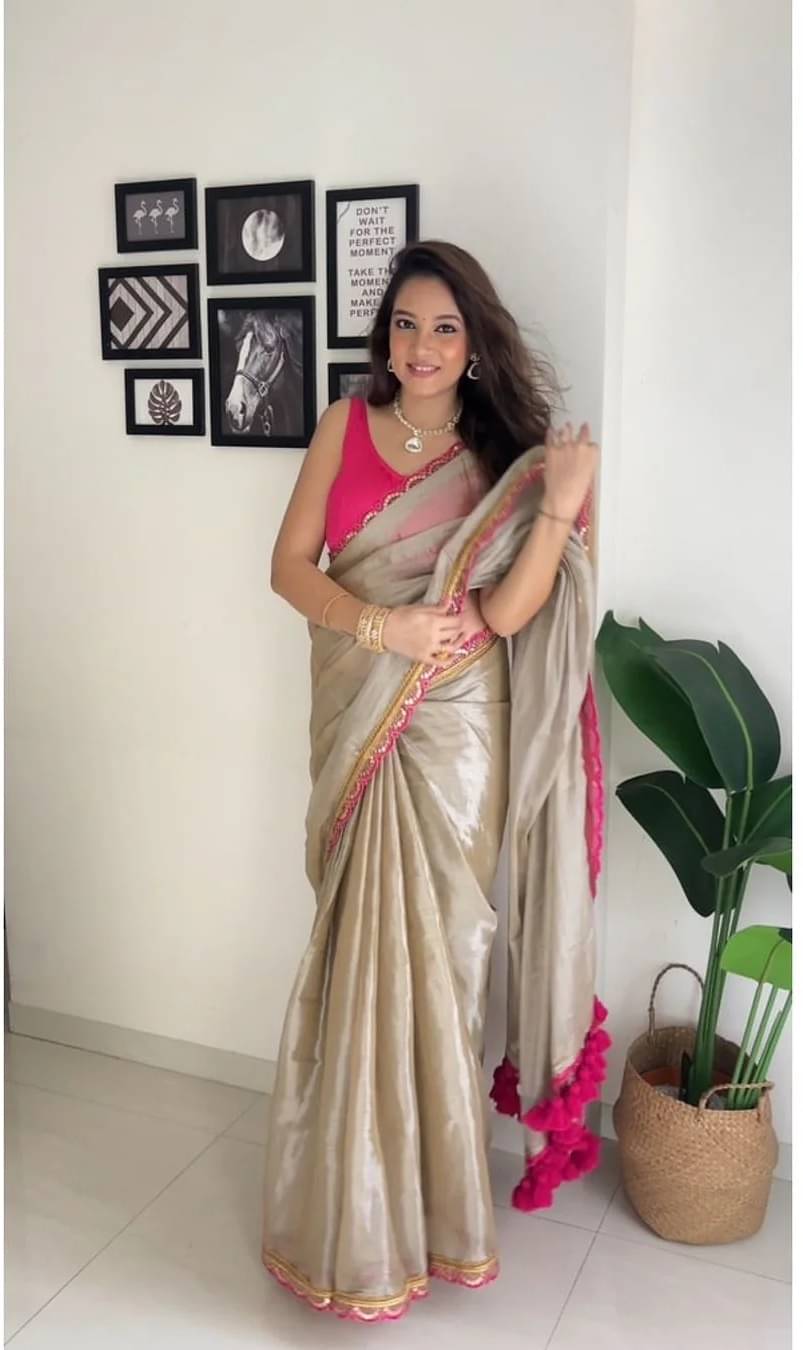 Vastukala Tissue Solid Saree With Unstitched Blouse Piece ( Beige ) Vastukala Tissue Solid Saree With Unstitched Blouse Piece ( Beige )