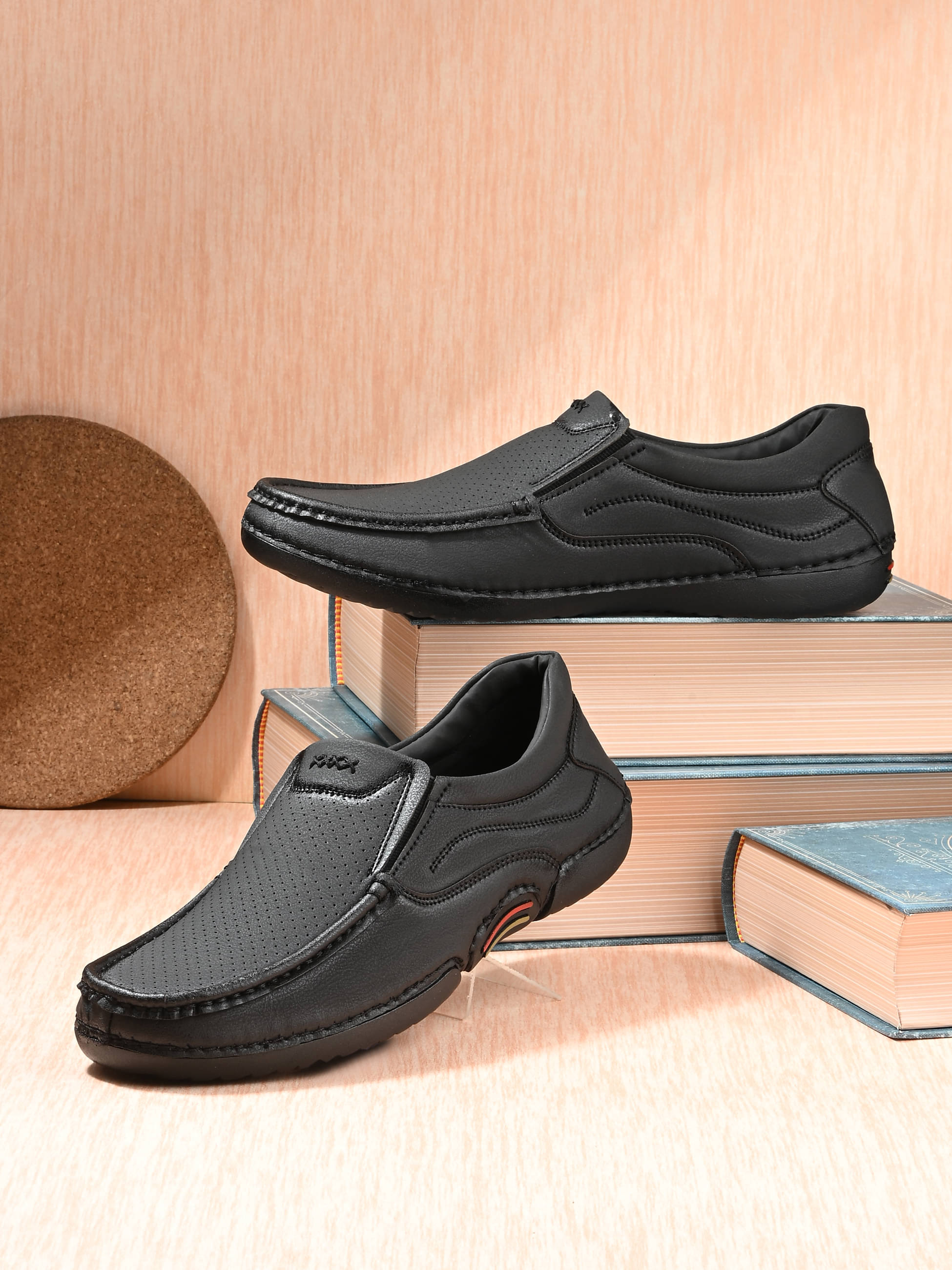     			Aadi Black Men's Slip on