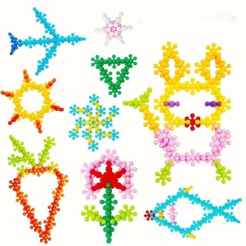     			Stysol 100pcs Plum Blossom 3D Flower Blocks DIY Interlocking Puzzle Plastic Construction Toys Educational Model All Packaged in Boxes
