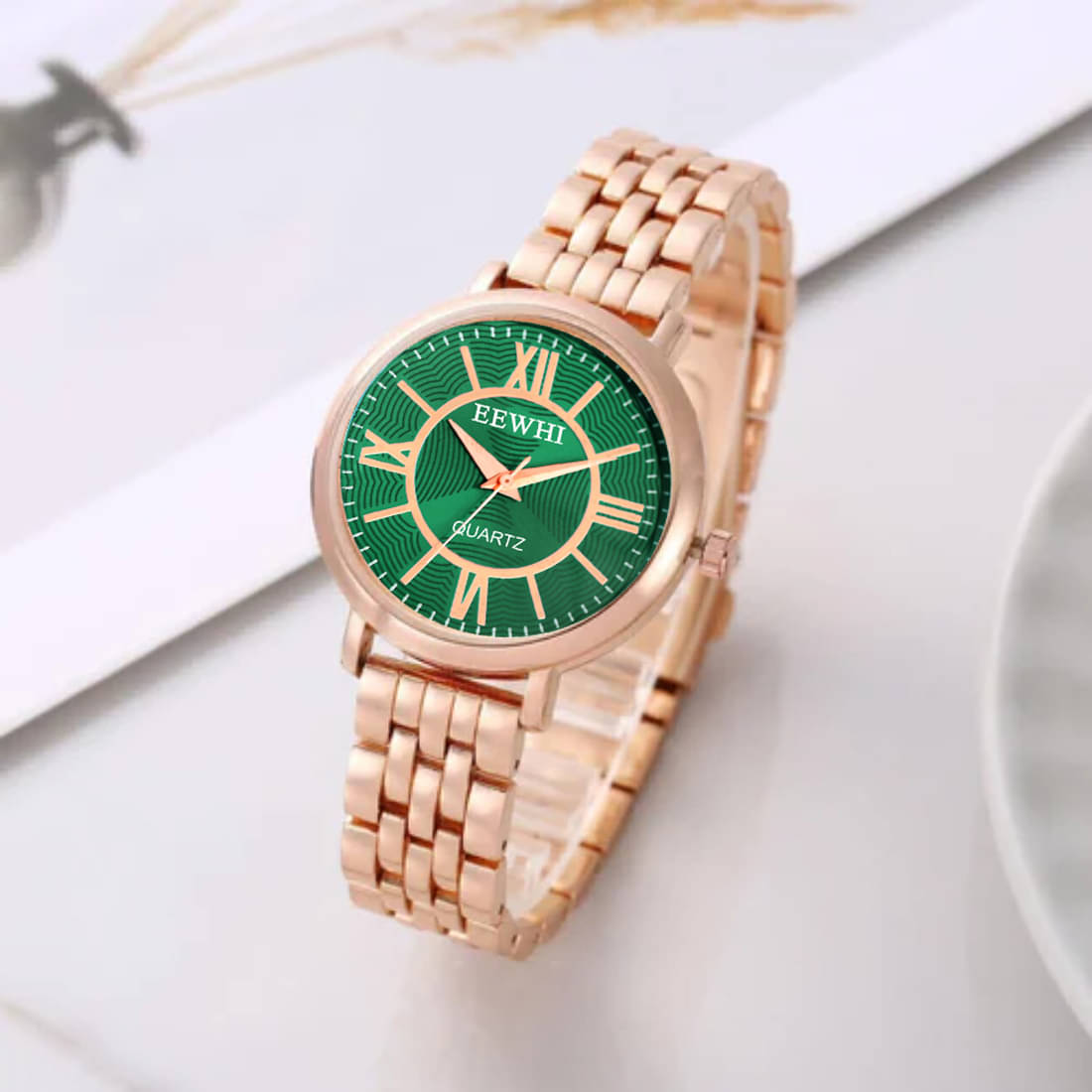     			EEWHI Rose Gold Metal Analog Womens Watch