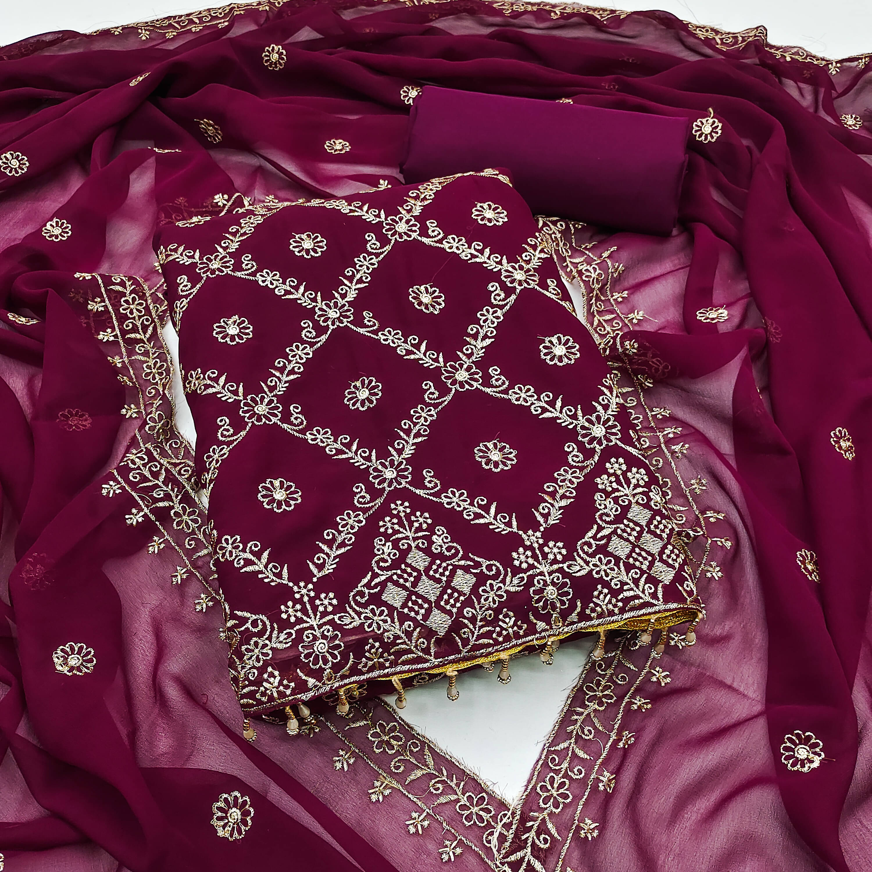 Nayanthara Trends Unstitched Georgette Embellished Dress Material - Purple ( Pack of 1 ) Nayanthara Trends Unstitched Georgette Embellished Dress Material - Purple ( Pack of 1 )