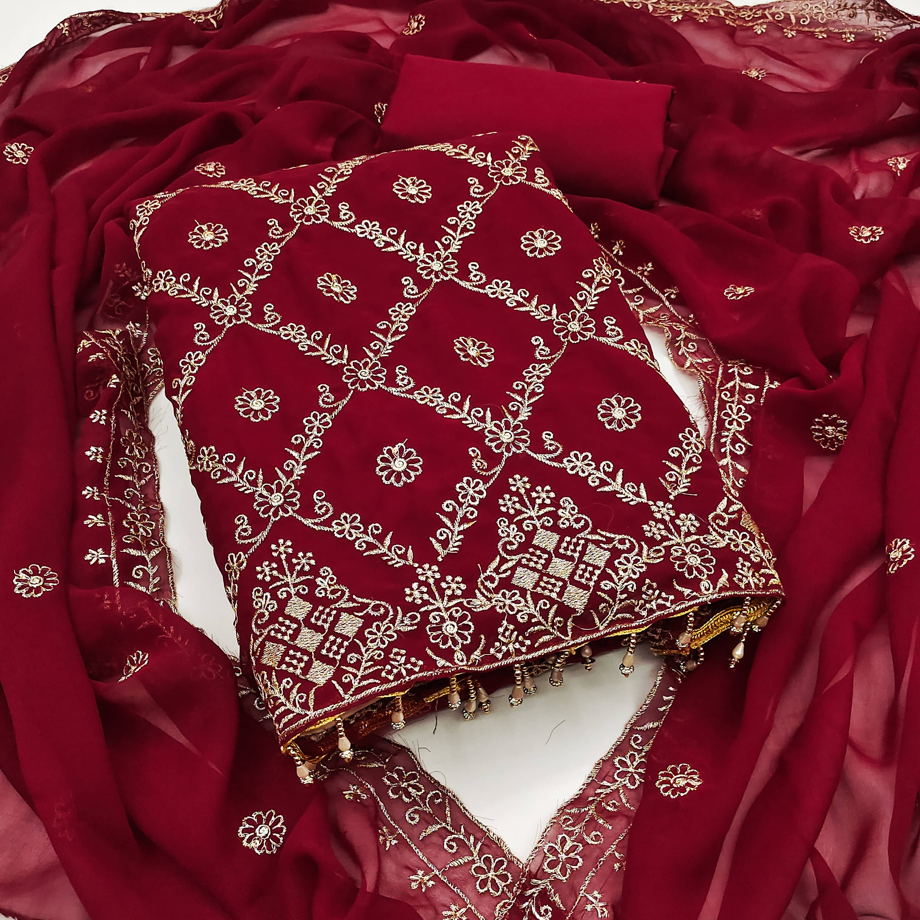     			Nayanthara Trends Unstitched Georgette Embellished Dress Material - Maroon ( Pack of 1 )