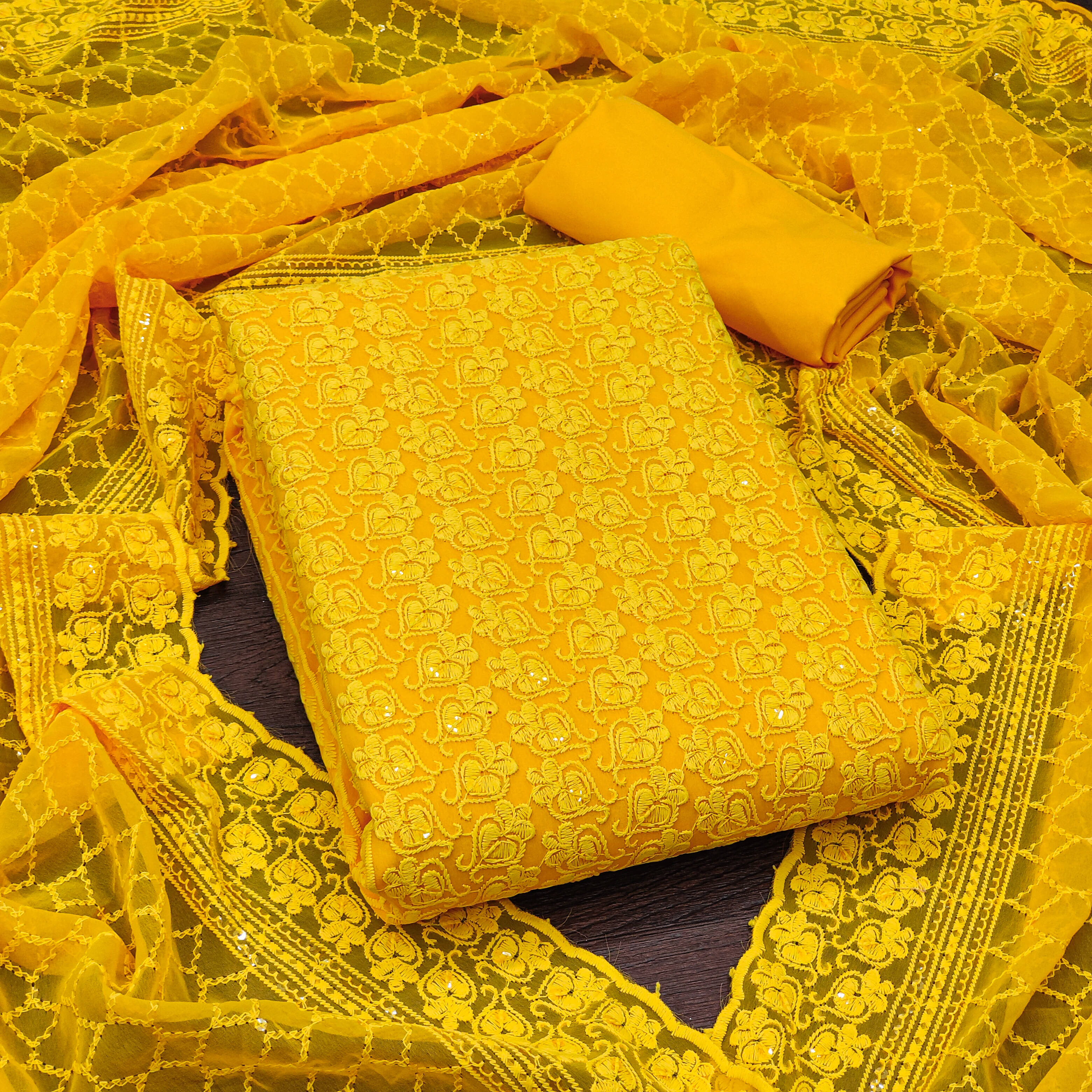 Nayanthara Trends Unstitched Georgette Embroidered Dress Material - Yellow ( Pack of 1 ) Nayanthara Trends Unstitched Georgette Embroidered Dress Material - Yellow ( Pack of 1 )