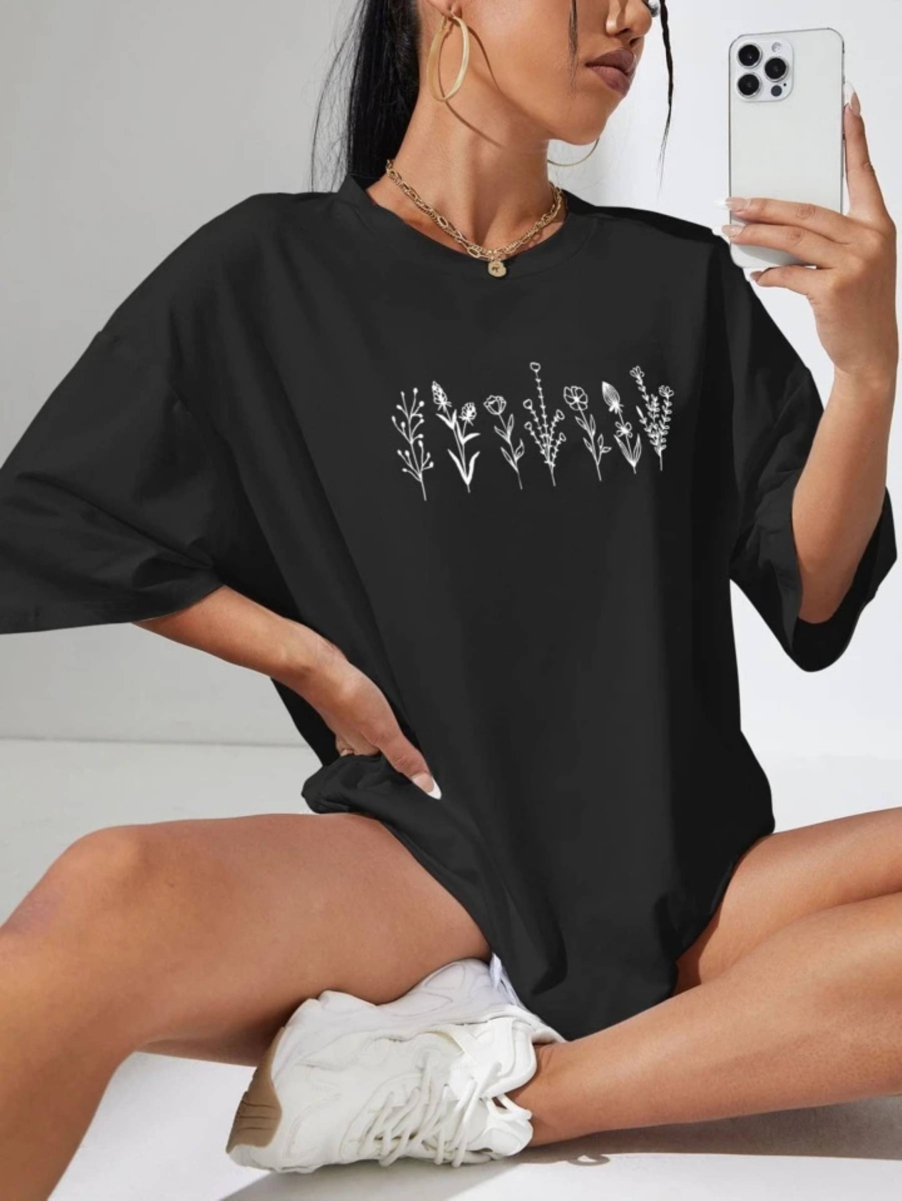 Kashian Women Cotton Blend Printed Oversized Fit Round Neck T-Shirt ( Black ) Kashian Women Cotton Blend Printed Oversized Fit Round Neck T-Shirt ( Black )