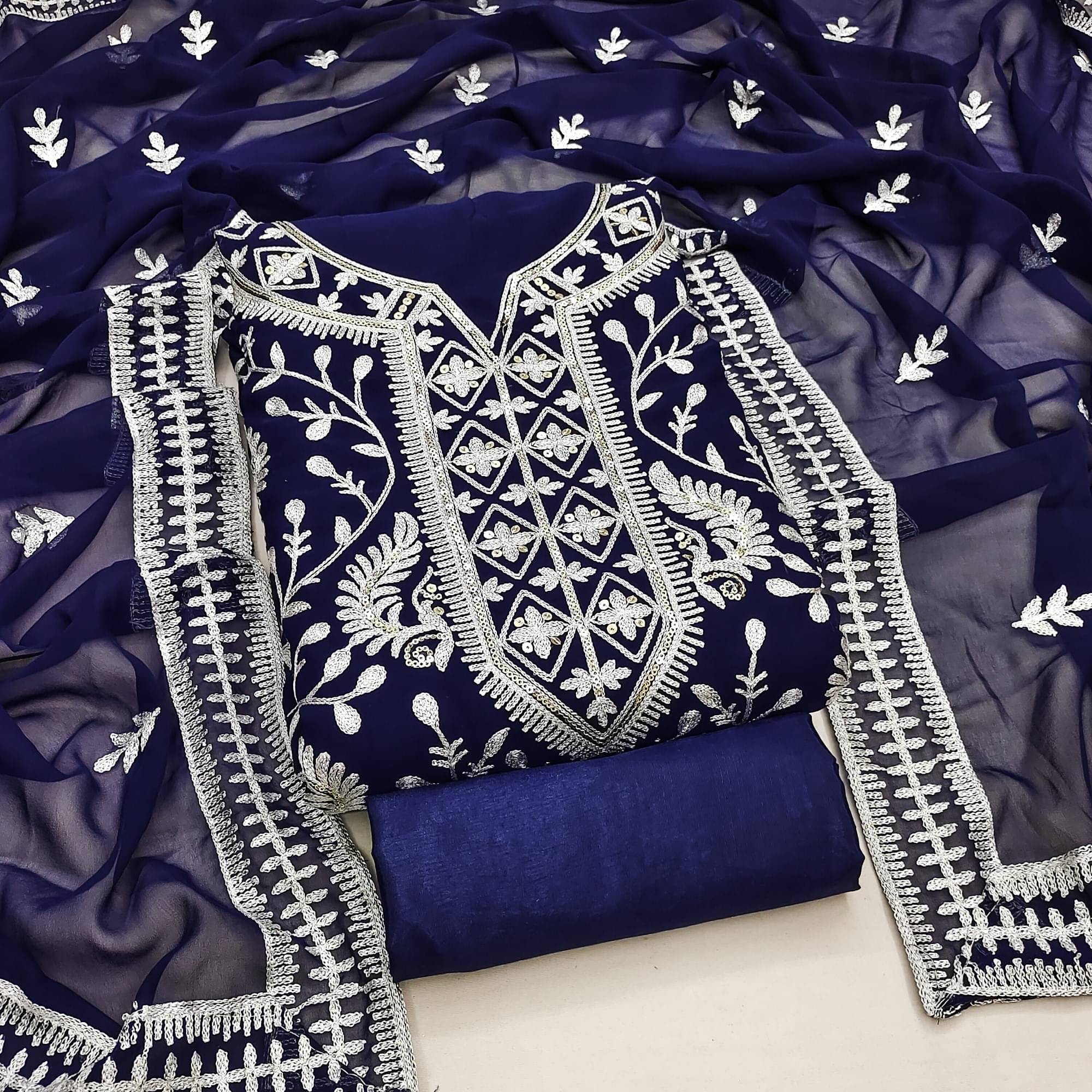 Rangtulika Ethnics Unstitched Georgette Embroidered Dress Material - Navy Blue ( Pack of 1 )     			Rangtulika Ethnics Unstitched Georgette Embroidered Dress Material - Navy Blue ( Pack of 1 )