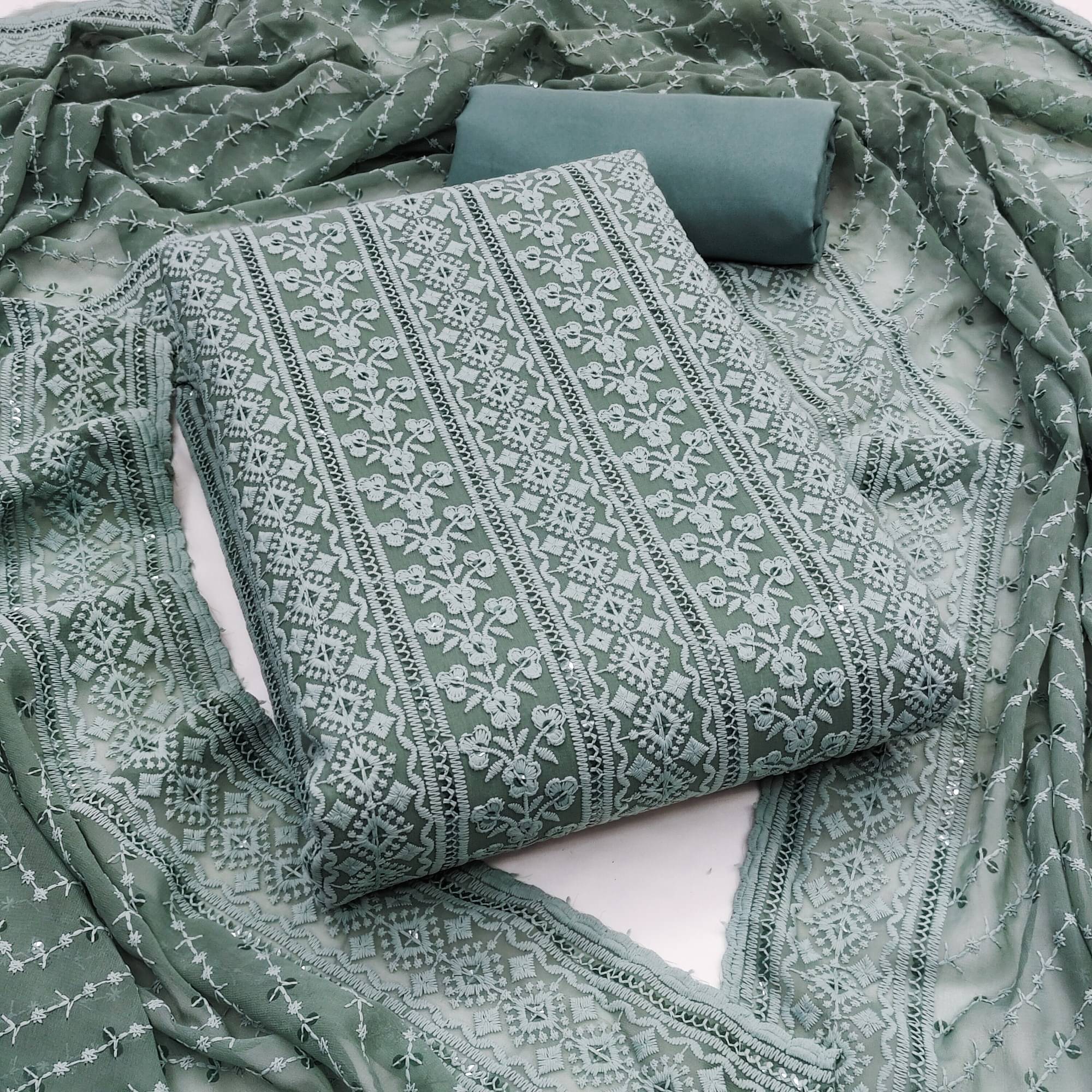 Rangtulika Ethnics Unstitched Georgette Printed Dress Material - Teal ( Pack of 1 )     			Rangtulika Ethnics Unstitched Georgette Printed Dress Material - Teal ( Pack of 1 )