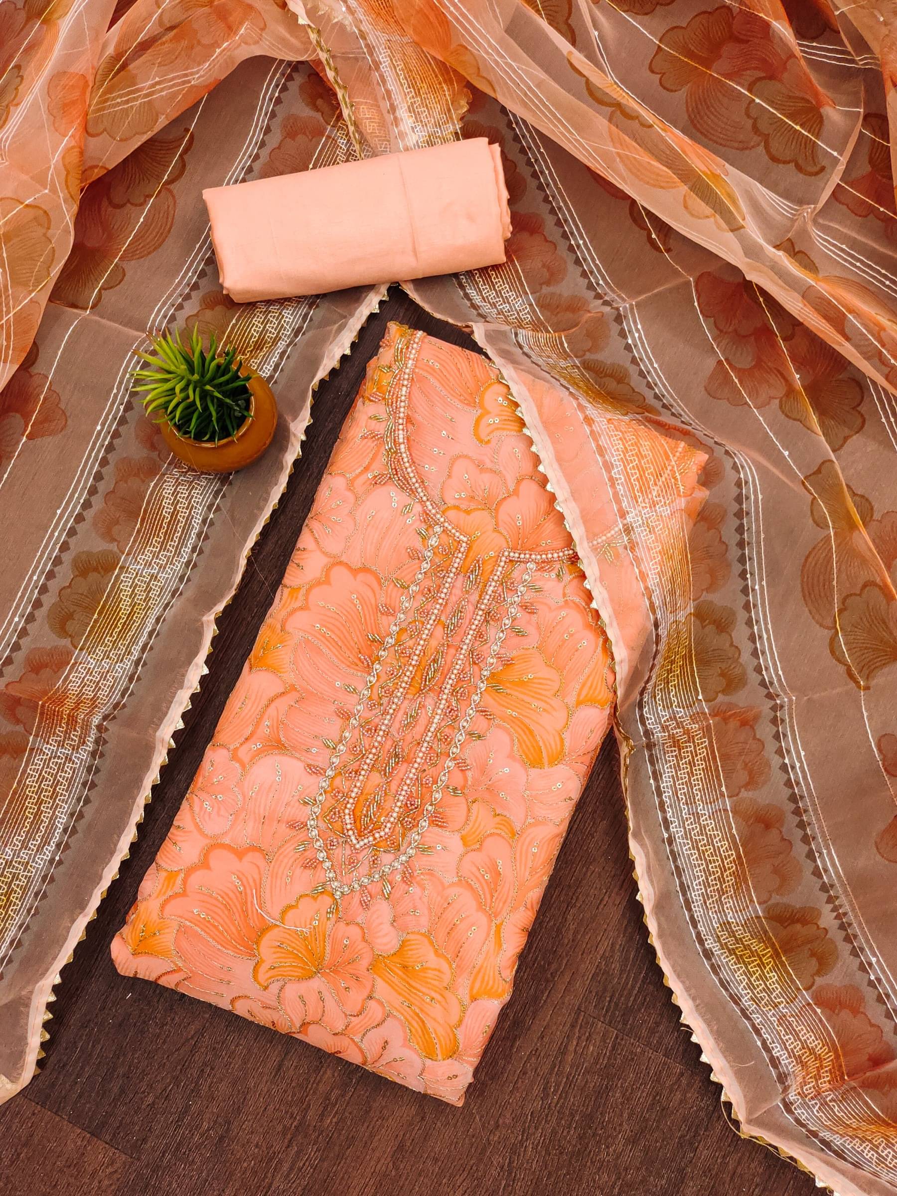 Rangtulika Ethnics Unstitched Organza Embellished Dress Material - Orange ( Pack of 1 ) Rangtulika Ethnics Unstitched Organza Embellished Dress Material - Orange ( Pack of 1 )