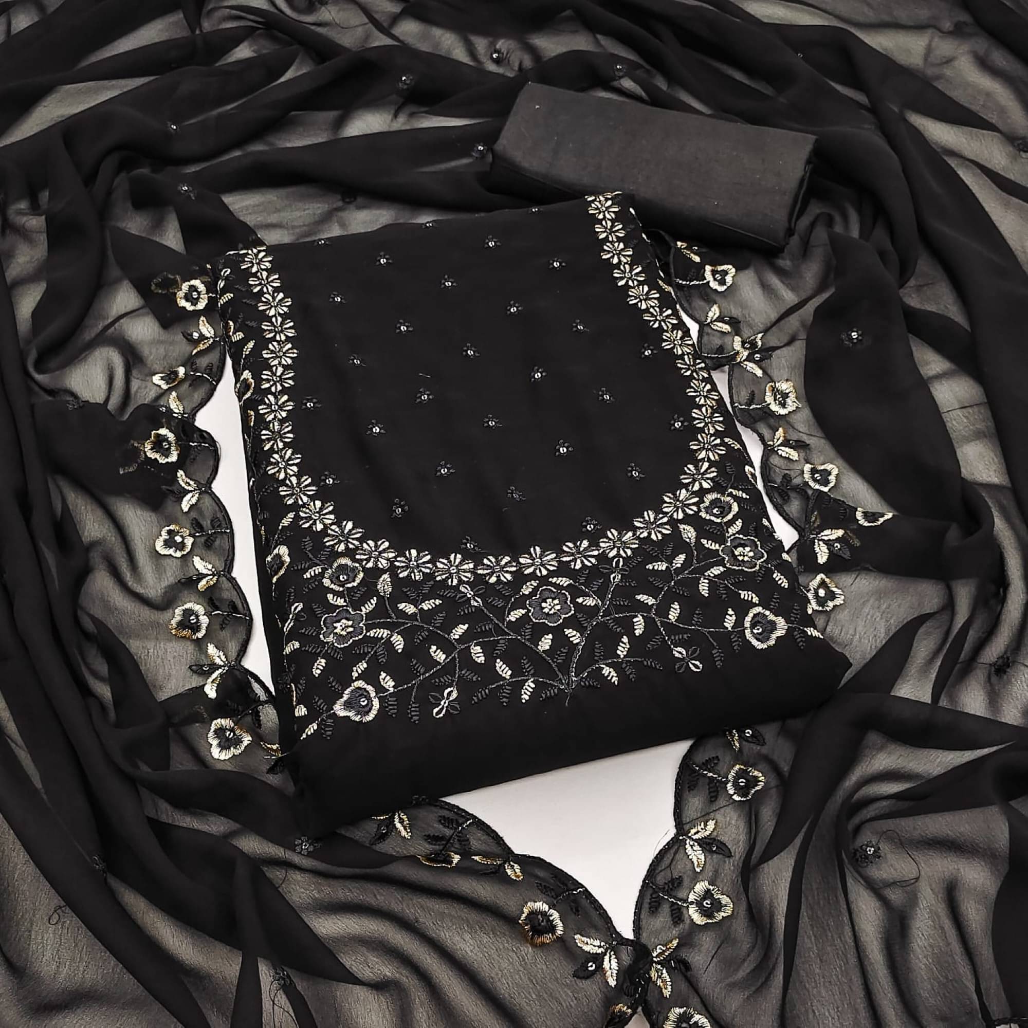 Rangtulika Ethnics Unstitched Silk Blend Embroidered Dress Material - Black ( Pack of 1 ) Rangtulika Ethnics Unstitched Silk Blend Embroidered Dress Material - Black ( Pack of 1 )