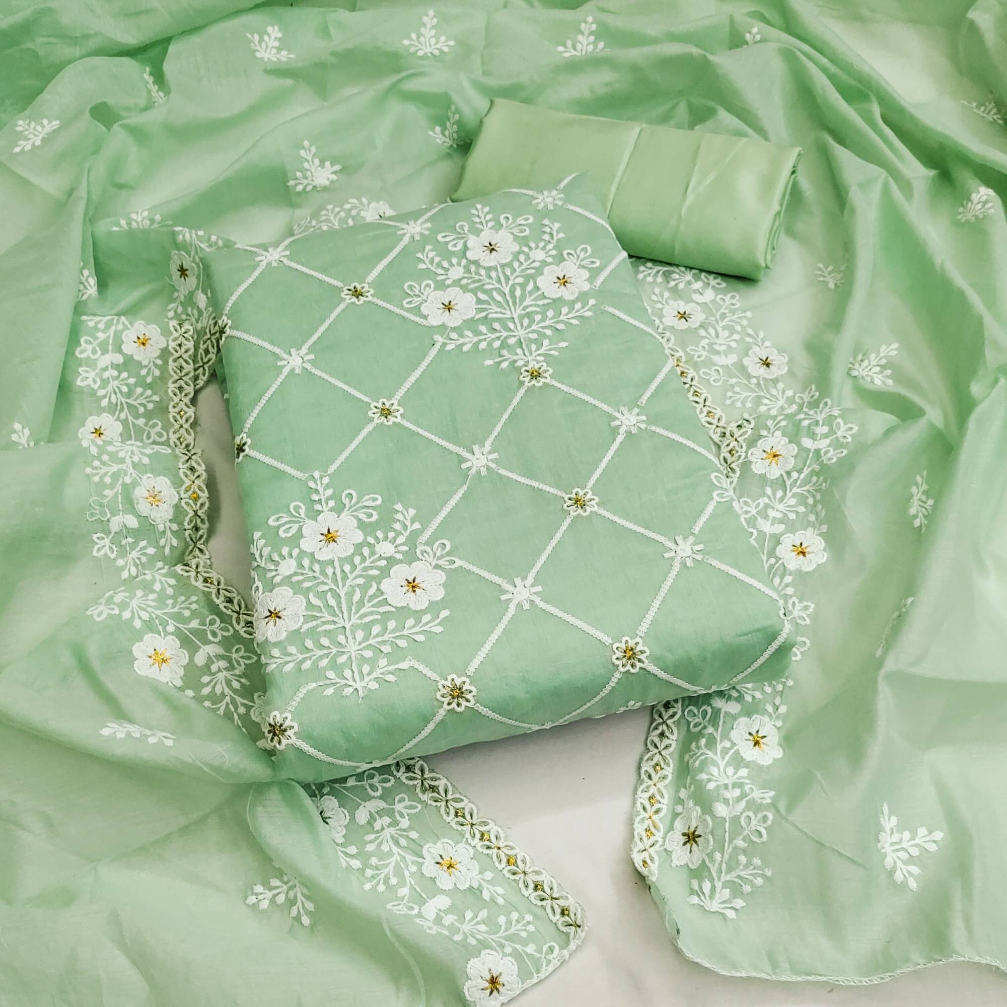 Rangtulika Ethnics Unstitched Cotton Embroidered Dress Material - Green ( Pack of 1 )     			Rangtulika Ethnics Unstitched Cotton Embroidered Dress Material - Green ( Pack of 1 )