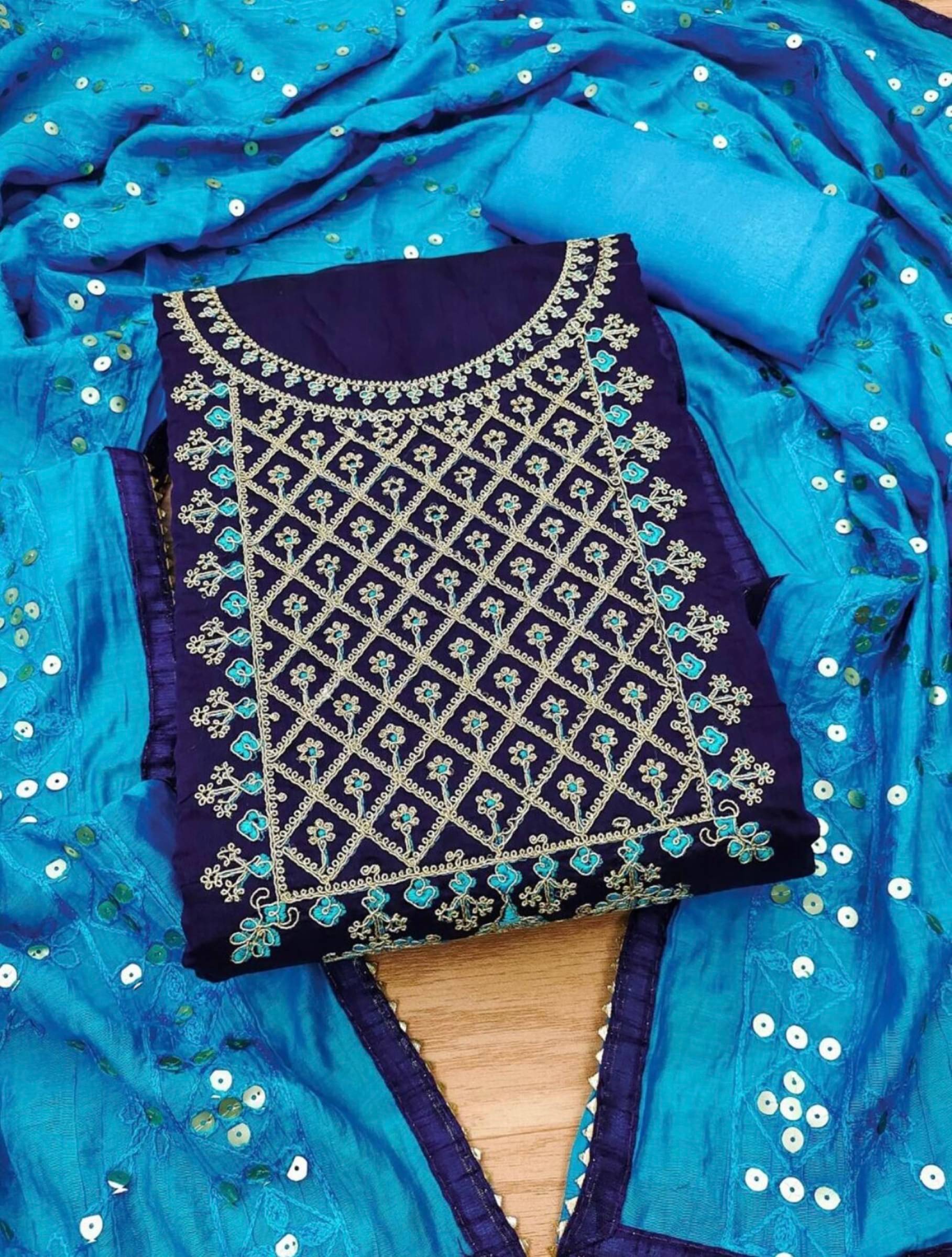 Rangtulika Ethnics Unstitched Cotton Embroidered Dress Material - Blue ( Pack of 1 )     			Rangtulika Ethnics Unstitched Cotton Embroidered Dress Material - Blue ( Pack of 1 )