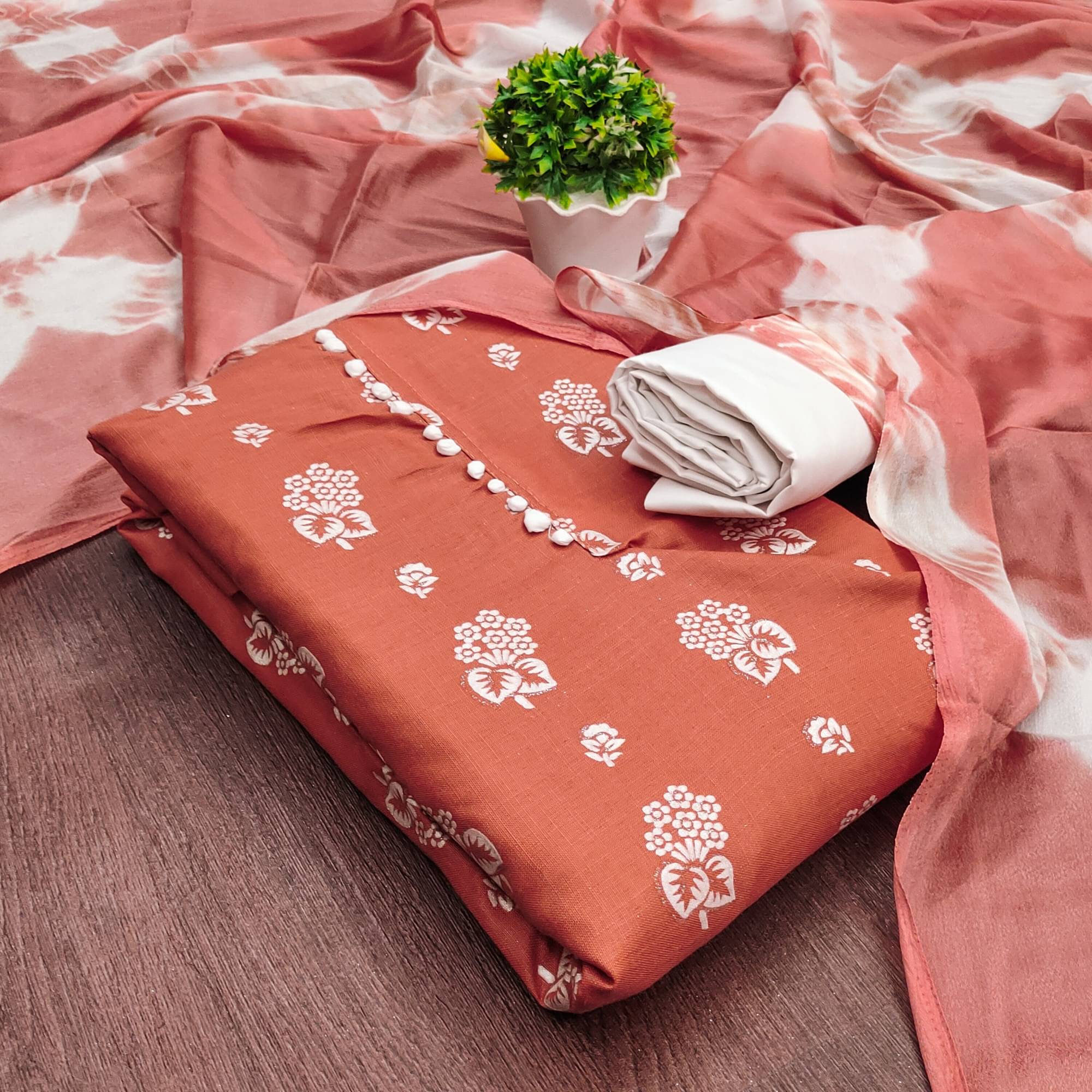 Rangtulika Ethnics Unstitched Cotton Printed Dress Material - Orange ( Pack of 1 ) Rangtulika Ethnics Unstitched Cotton Printed Dress Material - Orange ( Pack of 1 )