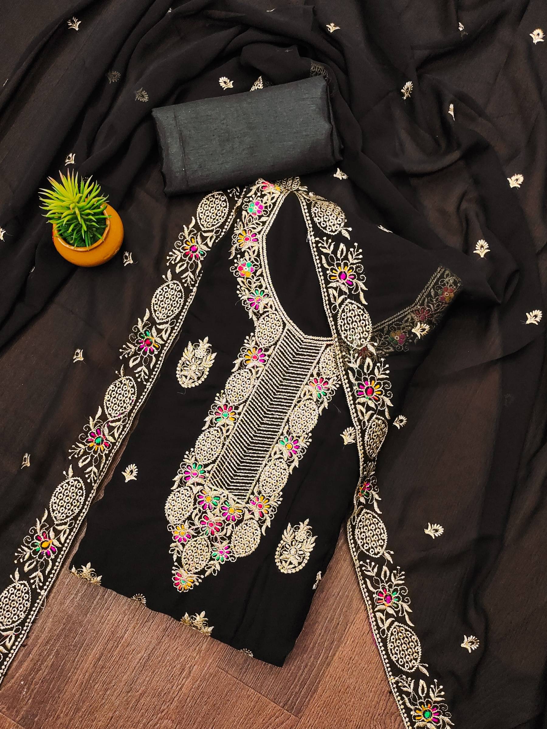 Rangtulika Ethnics Unstitched Georgette Embroidered Dress Material - Black ( Pack of 1 ) Rangtulika Ethnics Unstitched Georgette Embroidered Dress Material - Black ( Pack of 1 )
