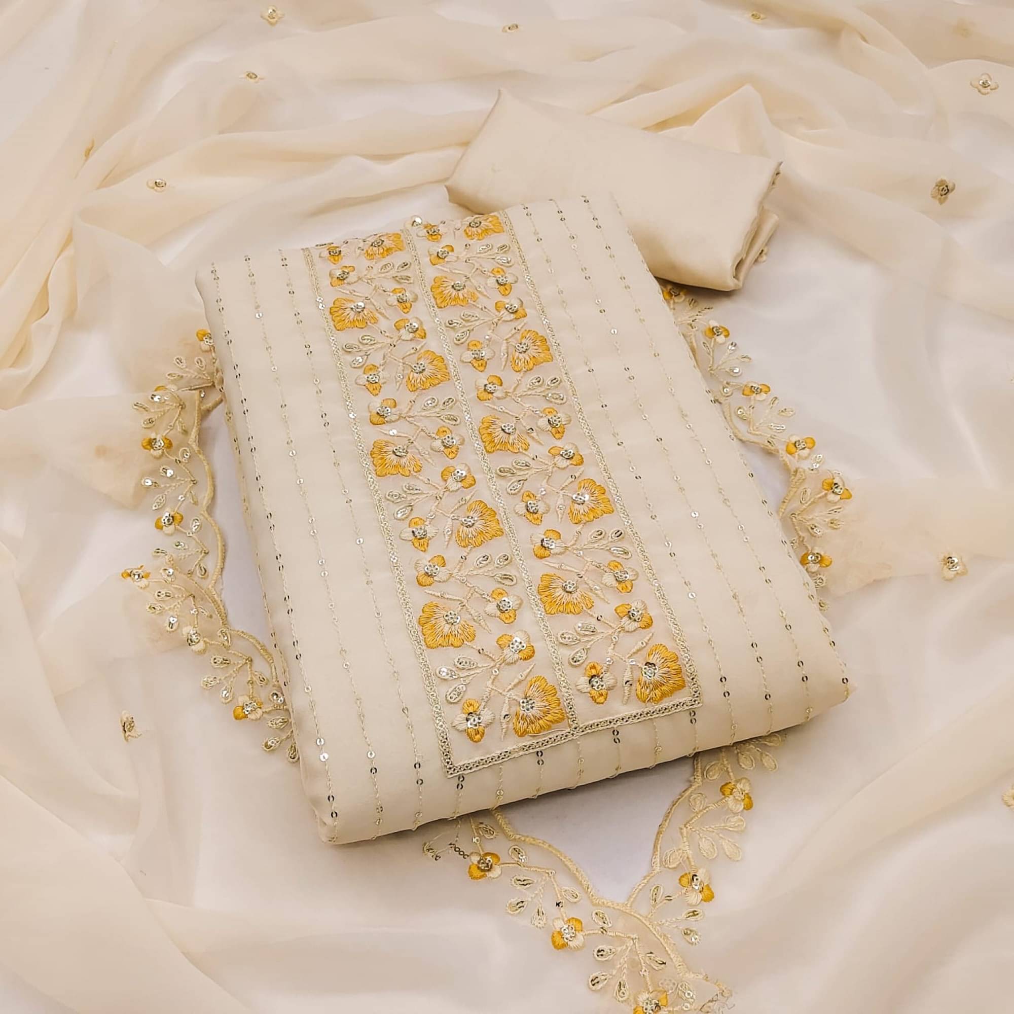 Rangtulika Ethnics Unstitched Georgette Embroidered Dress Material - Yellow ( Pack of 1 )     			Rangtulika Ethnics Unstitched Georgette Embroidered Dress Material - Yellow ( Pack of 1 )