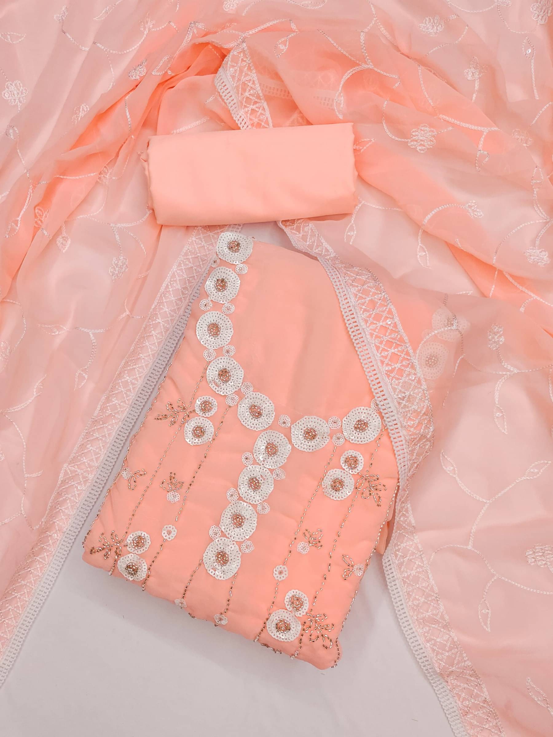 Rangtulika Ethnics Unstitched Georgette Embroidered Dress Material - Peach ( Pack of 1 )     			Rangtulika Ethnics Unstitched Georgette Embroidered Dress Material - Peach ( Pack of 1 )